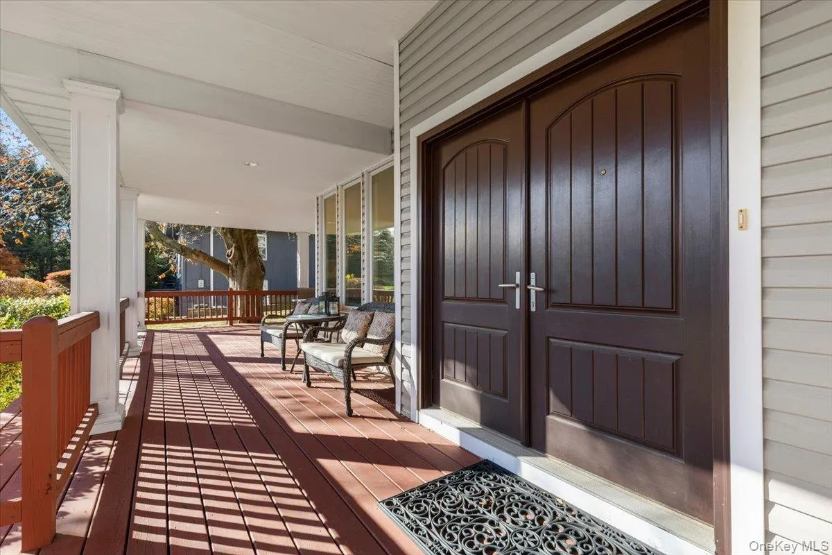 Beautiful double french doors and welcoming front porch! Beautiful double french doors and welcoming front porch!