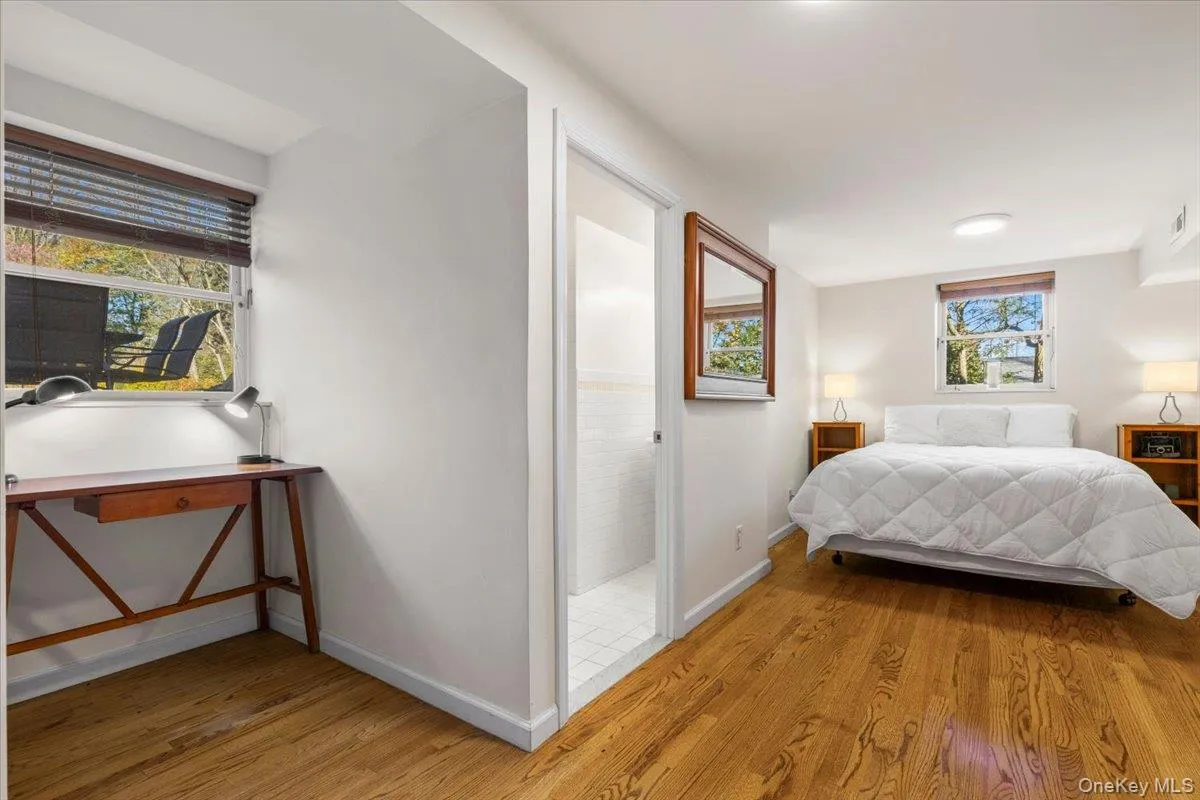 Sixth bedroom on lower level with private bathroom Sixth bedroom on lower level with private bathroom