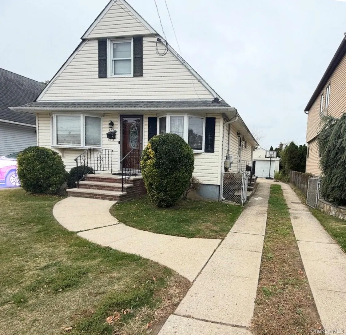 Bungalow-style home featuring a gate Bungalow-style home featuring a gate