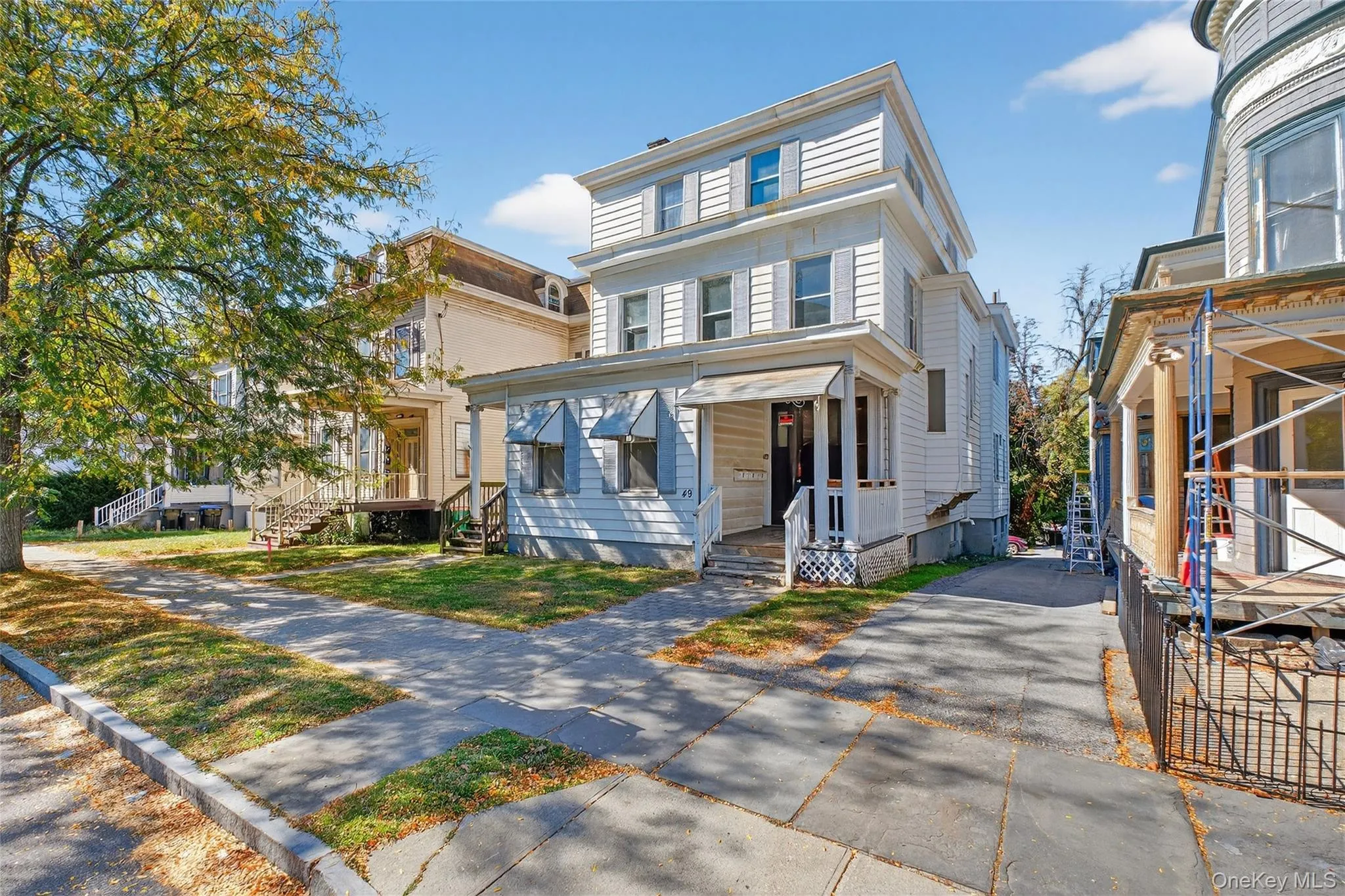 Traditional style home with a front lawn Traditional style home with a front lawn