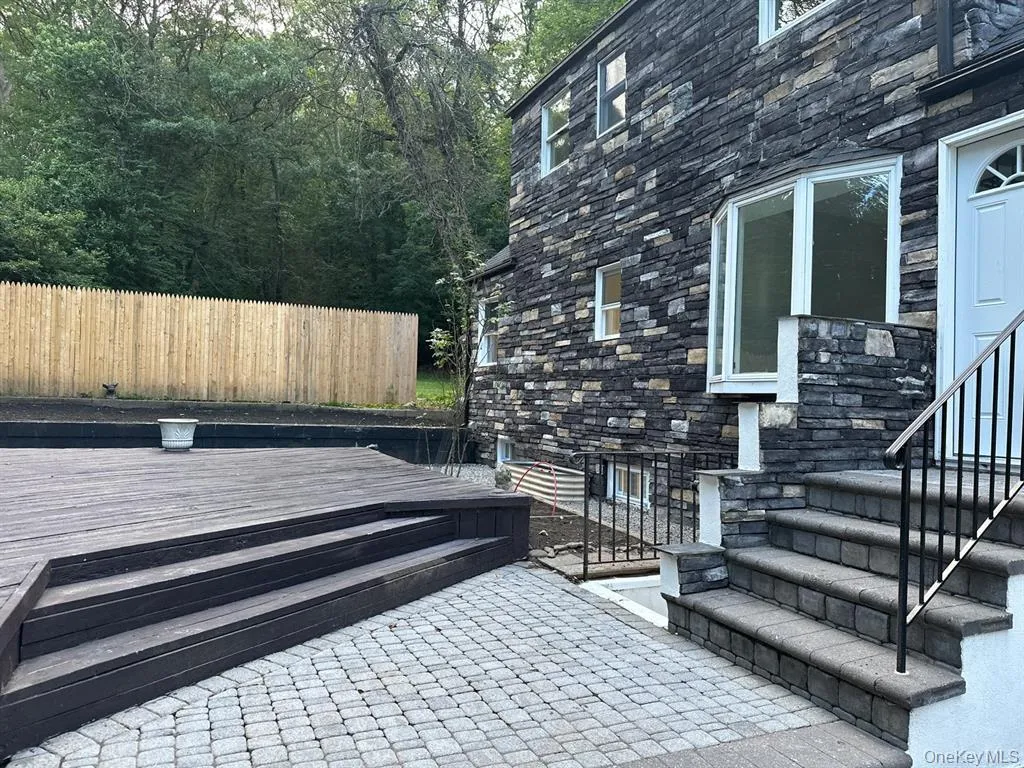 Deck with a patio area Deck with a patio area