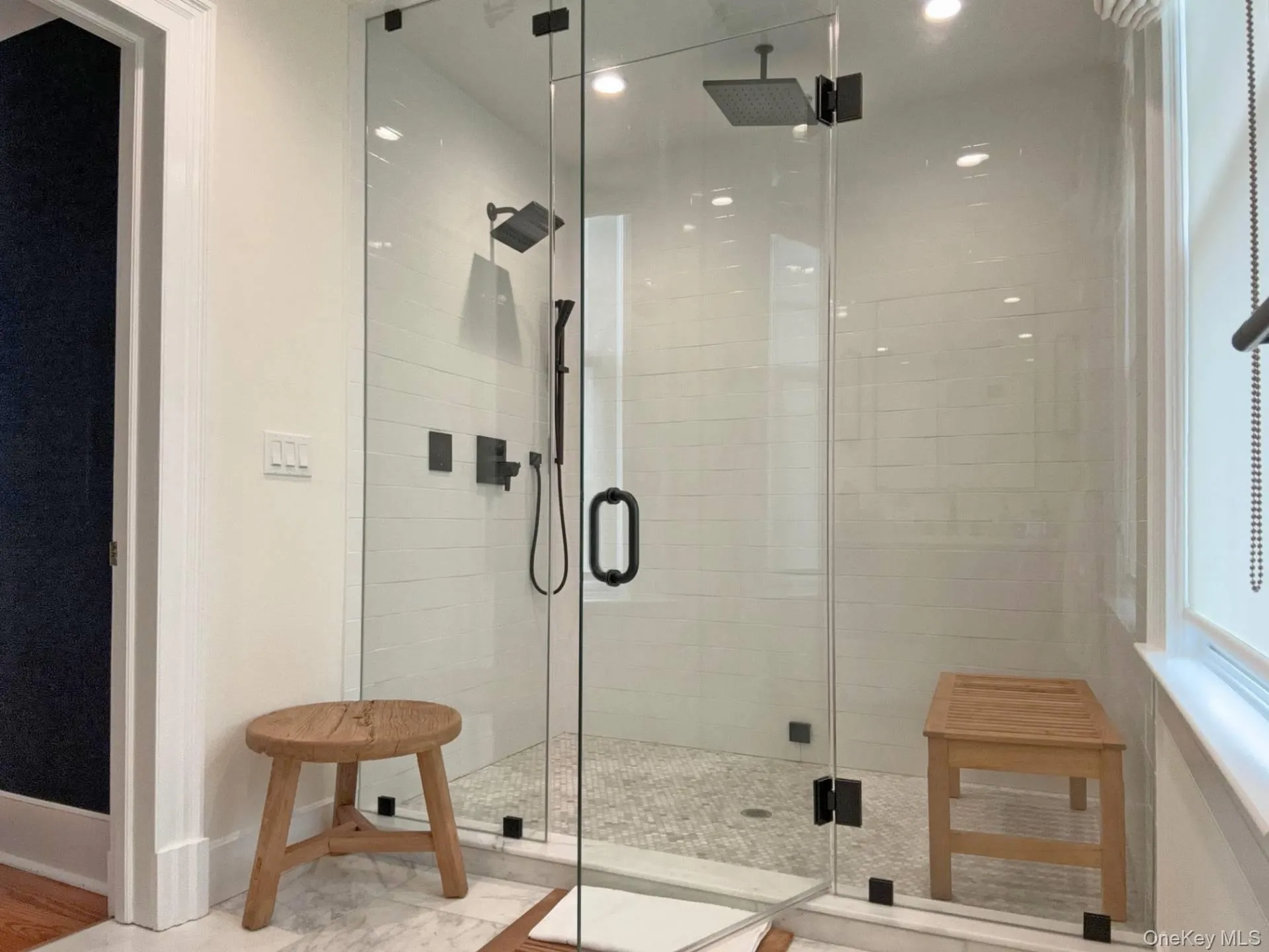 Full bathroom featuring a stall shower and recessed lighting Full bathroom featuring a stall shower and recessed lighting