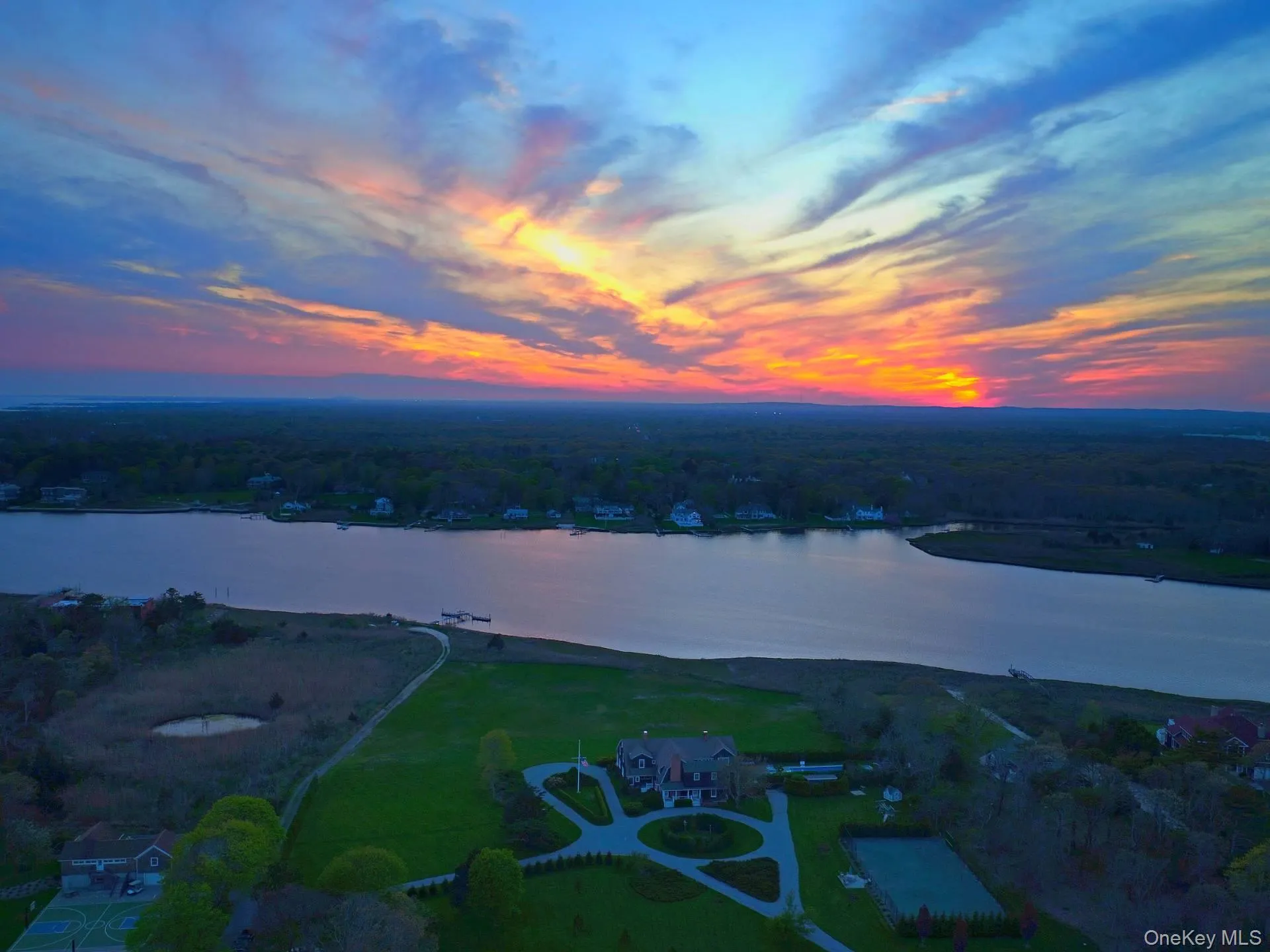 Aerial view at dusk of a water view Aerial view at dusk of a water view