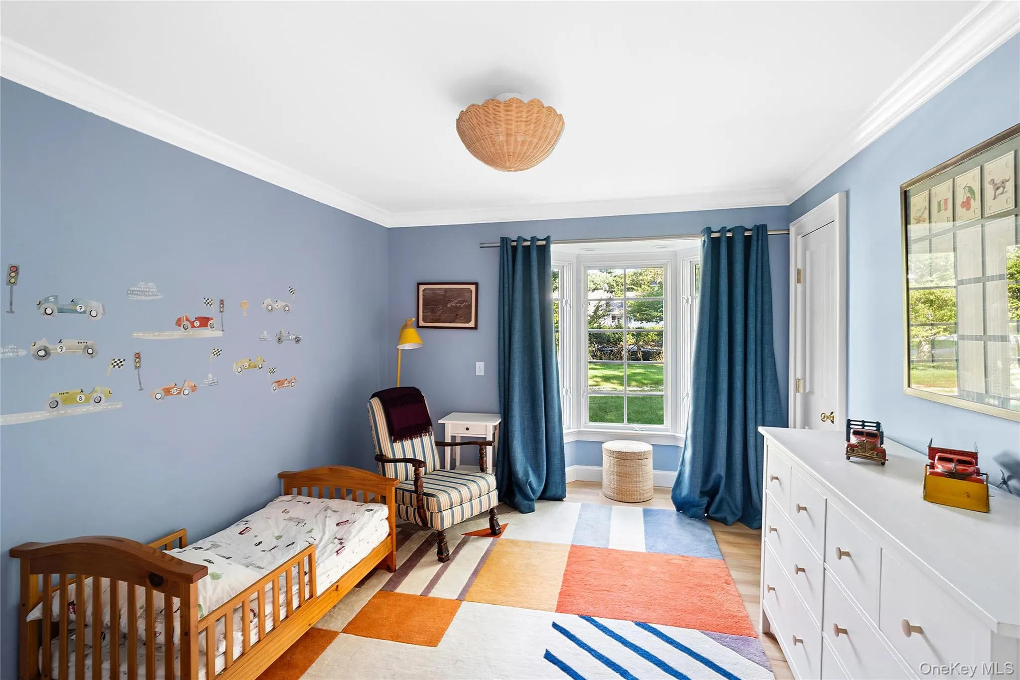 Bedroom featuring ornamental molding Bedroom featuring ornamental molding
