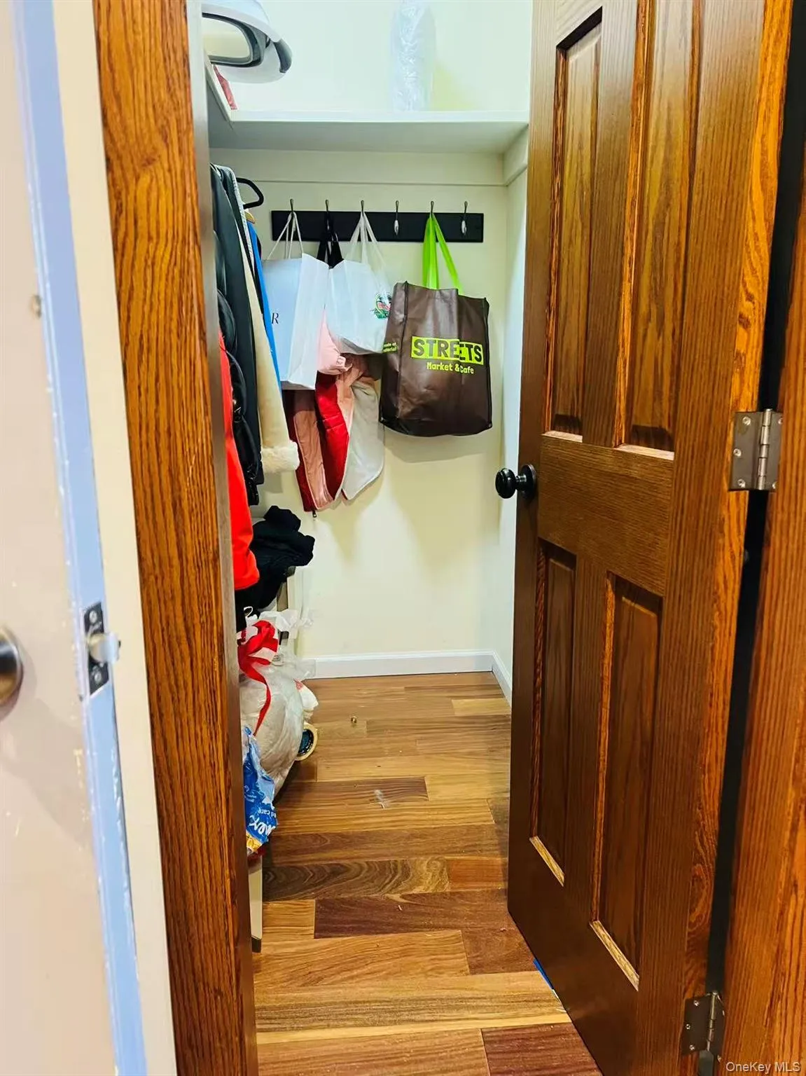 Mudroom with baseboards and light wood-style floors Mudroom with baseboards and light wood-style floors