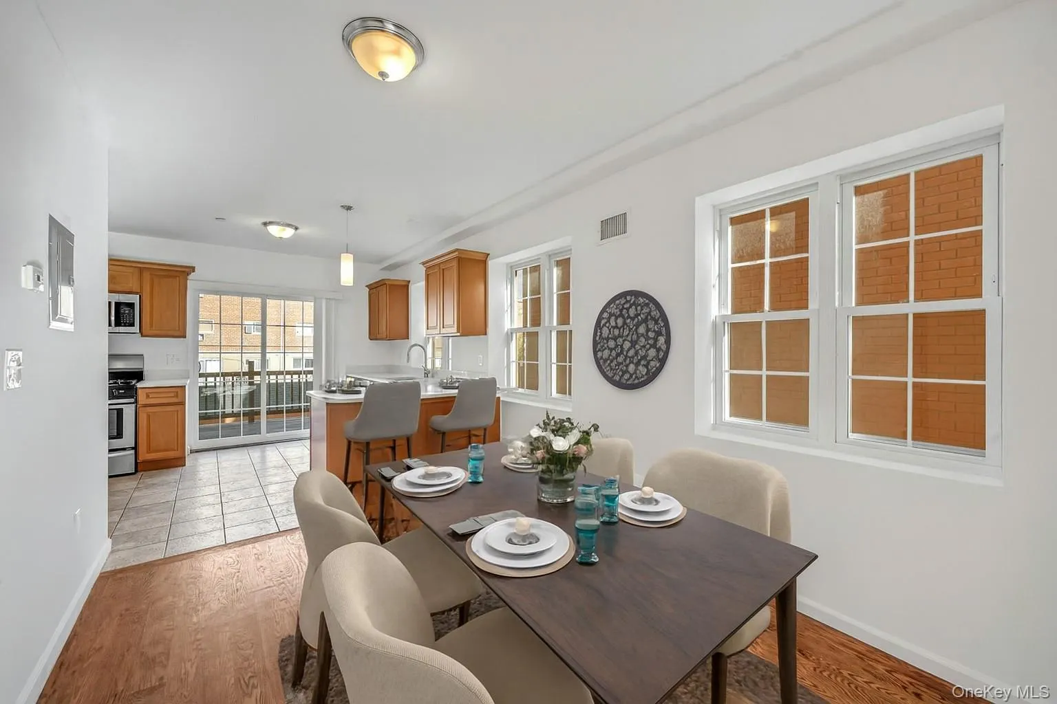 Virtually staged Dining Room and Eat In Kitchen with seating for 2 Virtually staged Dining Room and Eat In Kitchen with seating for 2