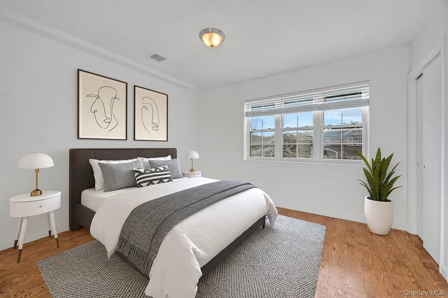 Virtually staged primary bedroom Virtually staged primary bedroom