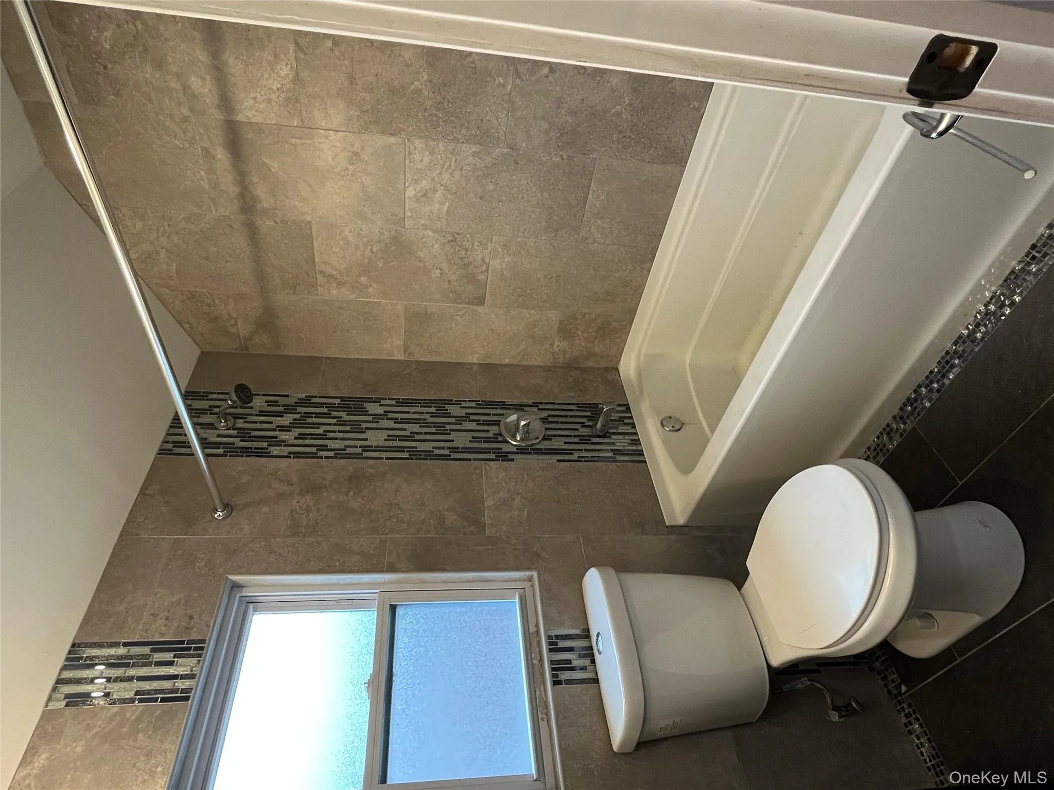 Main bathroom with tub and shower Main bathroom with tub and shower