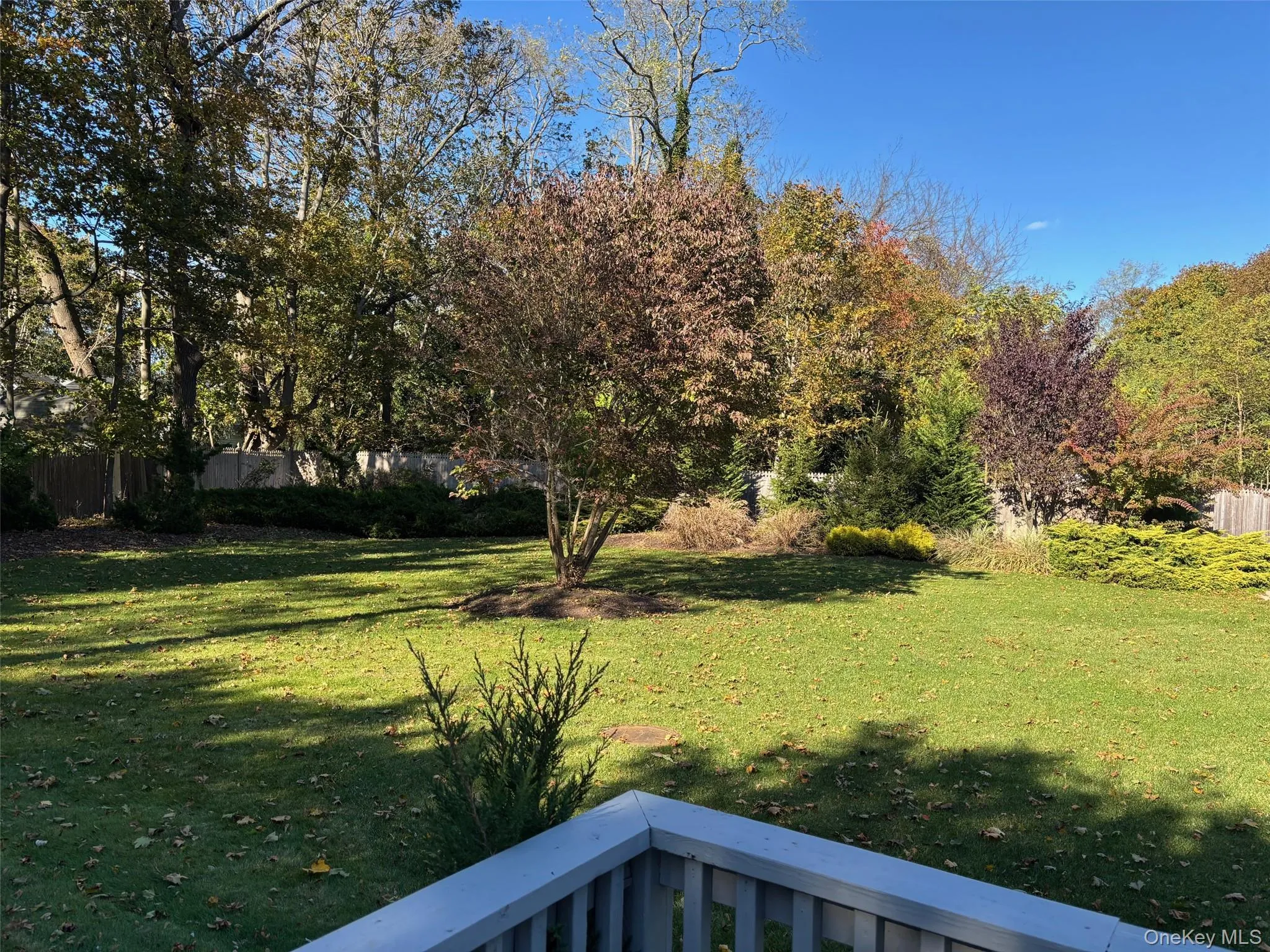 View of yard with a balcony View of yard with a balcony