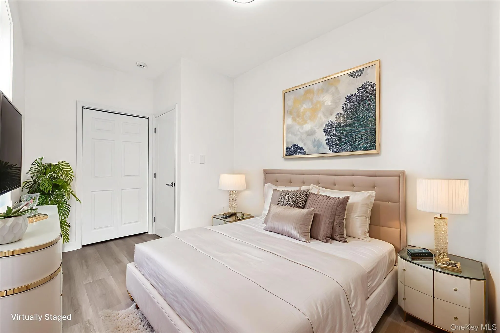 Bedroom with wood finished floors Bedroom with wood finished floors