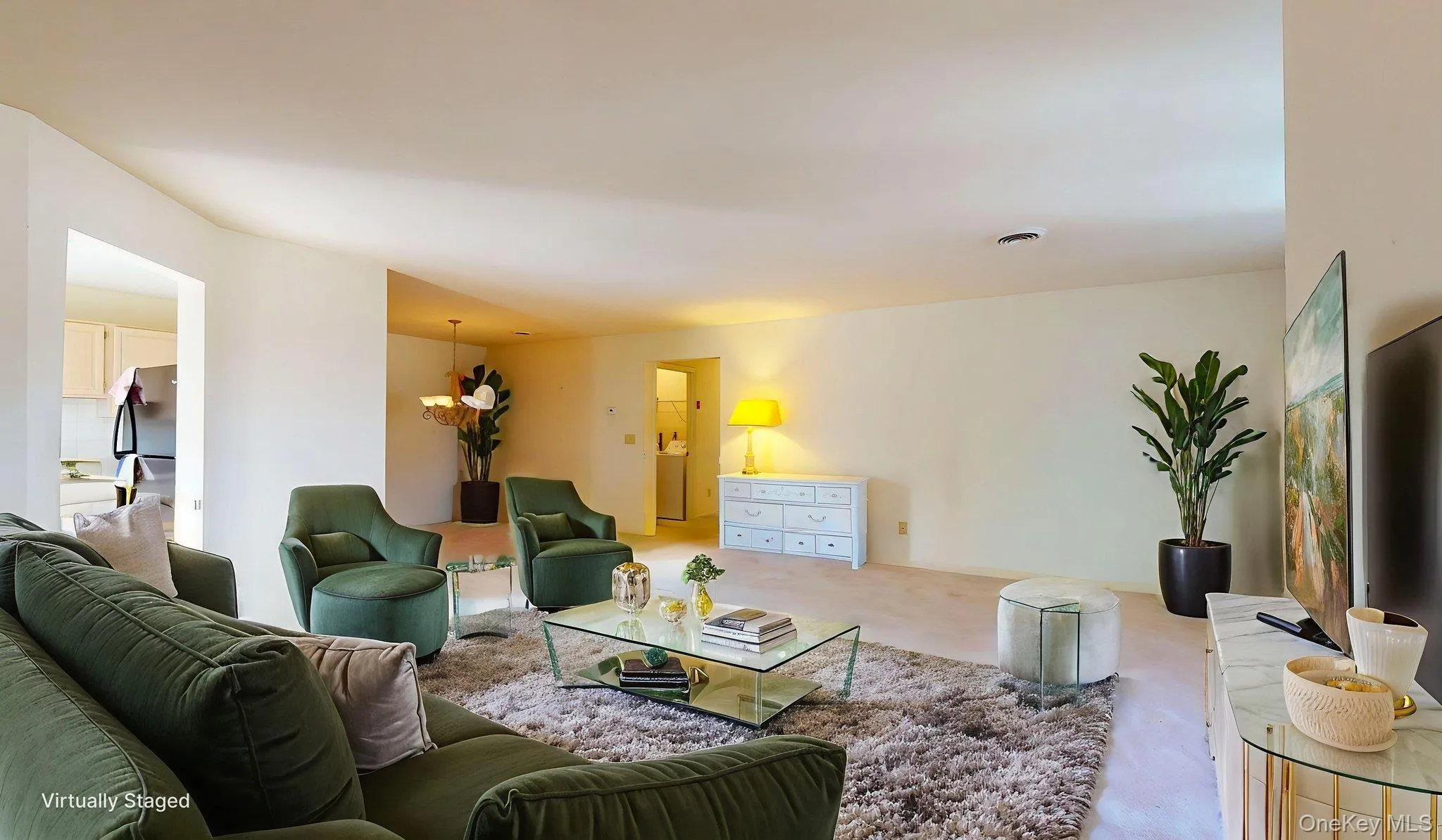 Carpeted living room with washer / clothes dryer Carpeted living room with washer / clothes dryer