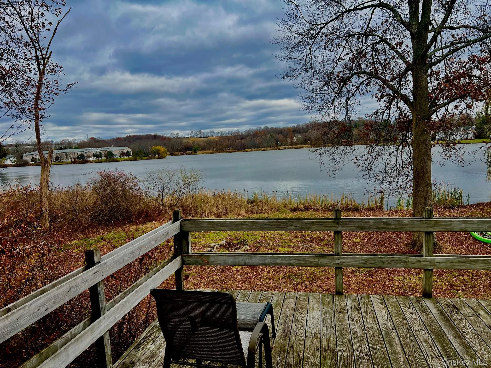 Wooden deck with a water view Wooden deck with a water view