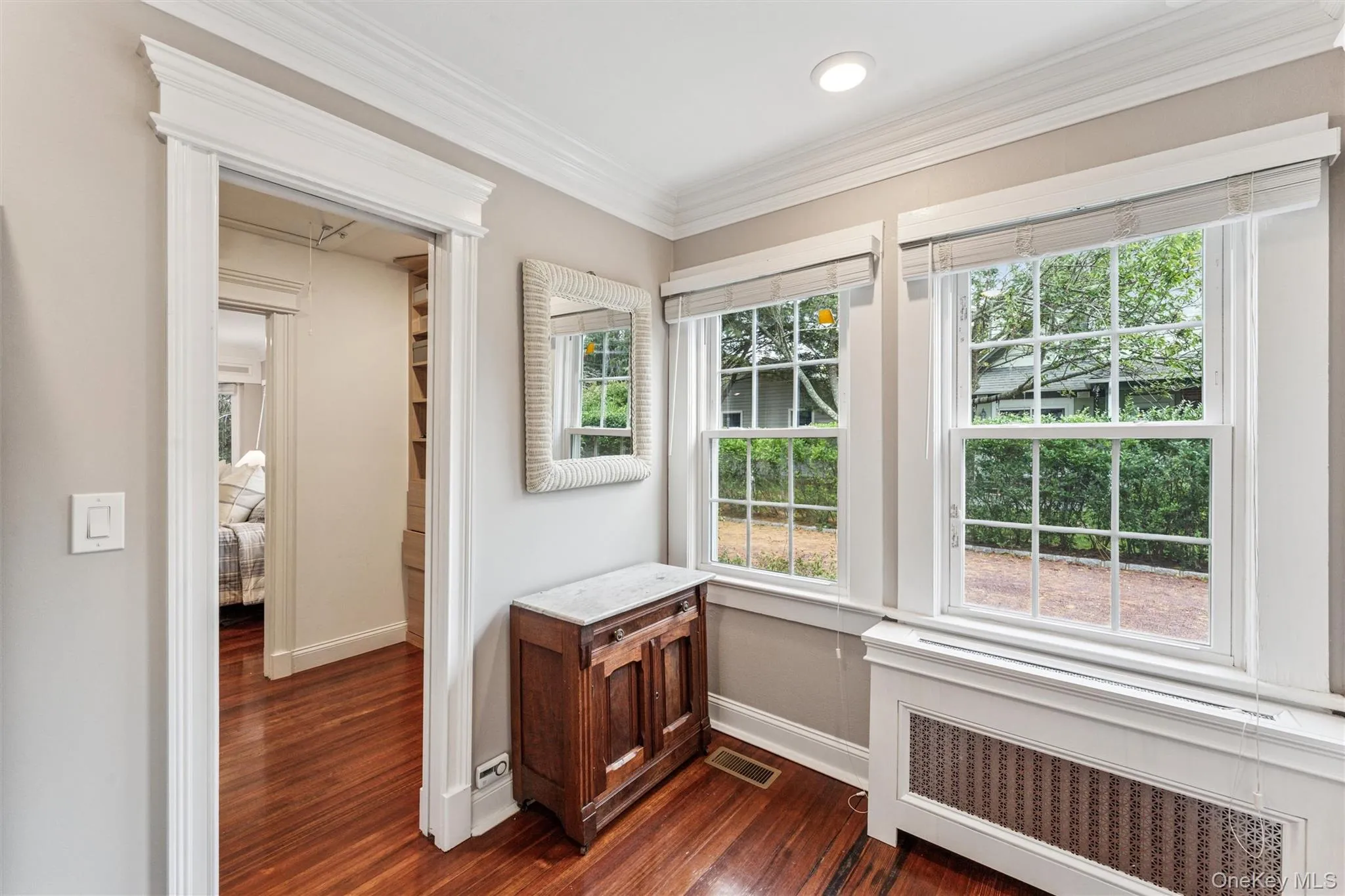 Unfurnished sunroom with radiator heating unit Unfurnished sunroom with radiator heating unit