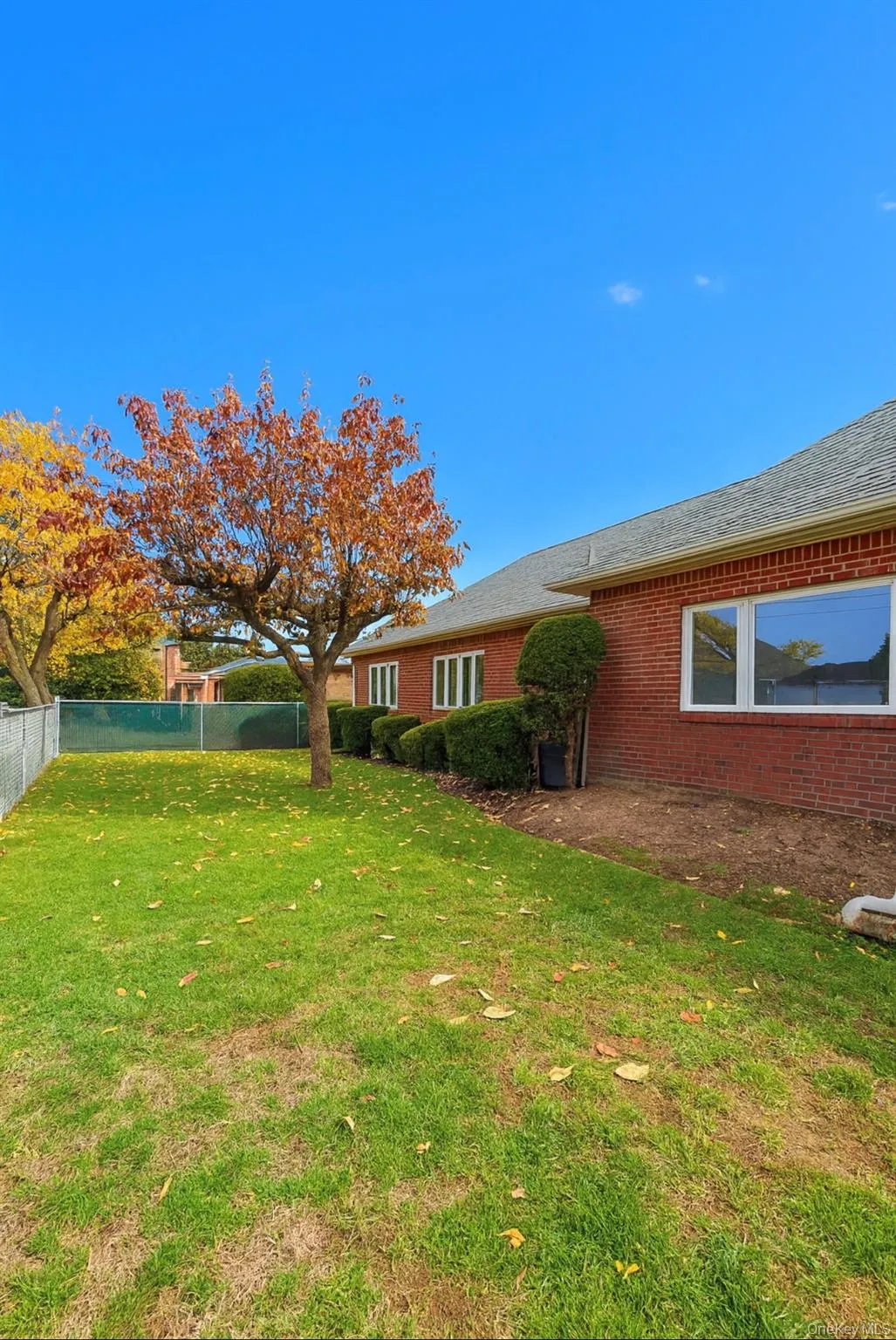 View of fenced in side yard View of fenced in side yard