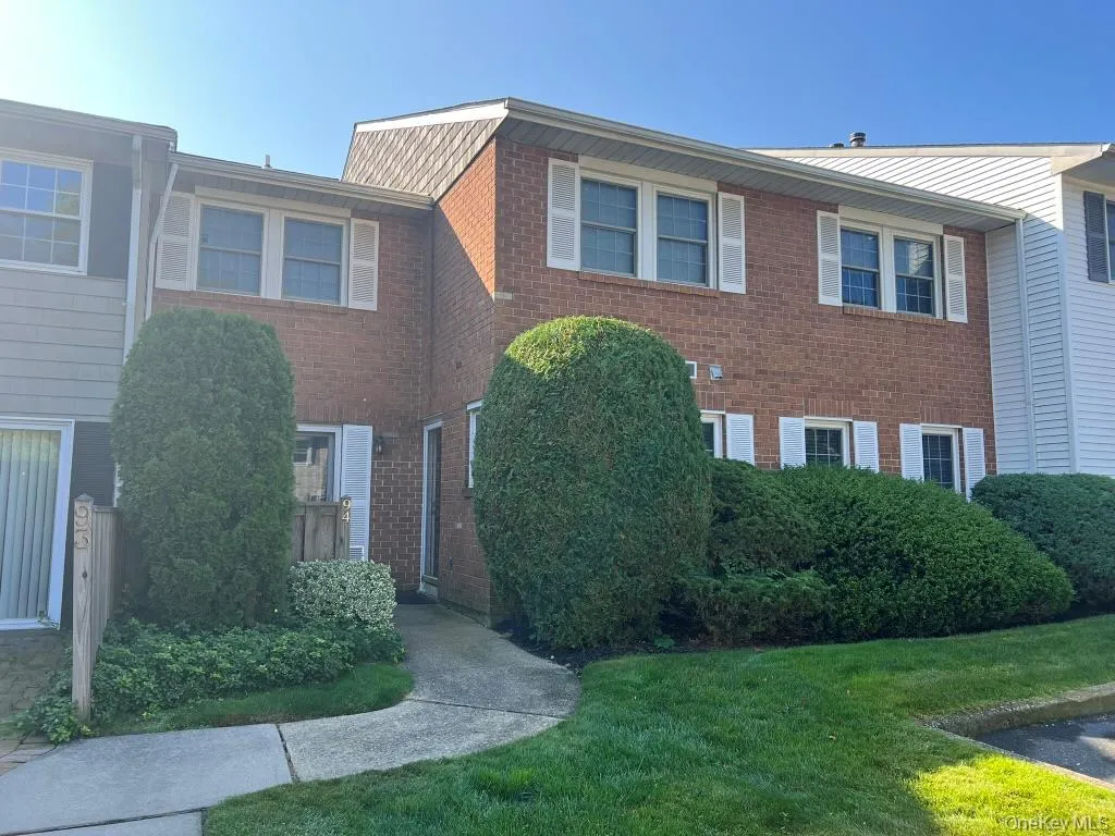 View of front of property featuring brick siding View of front of property featuring brick siding