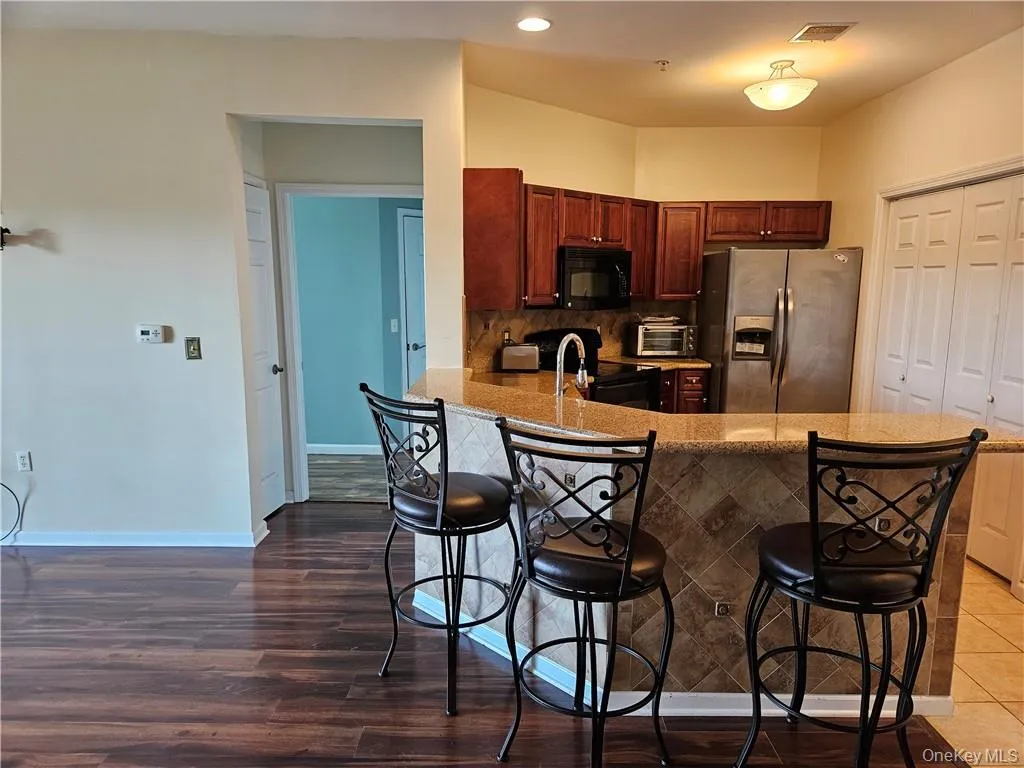 Looking toward the primary bedroom suite. Looking toward the primary bedroom suite.