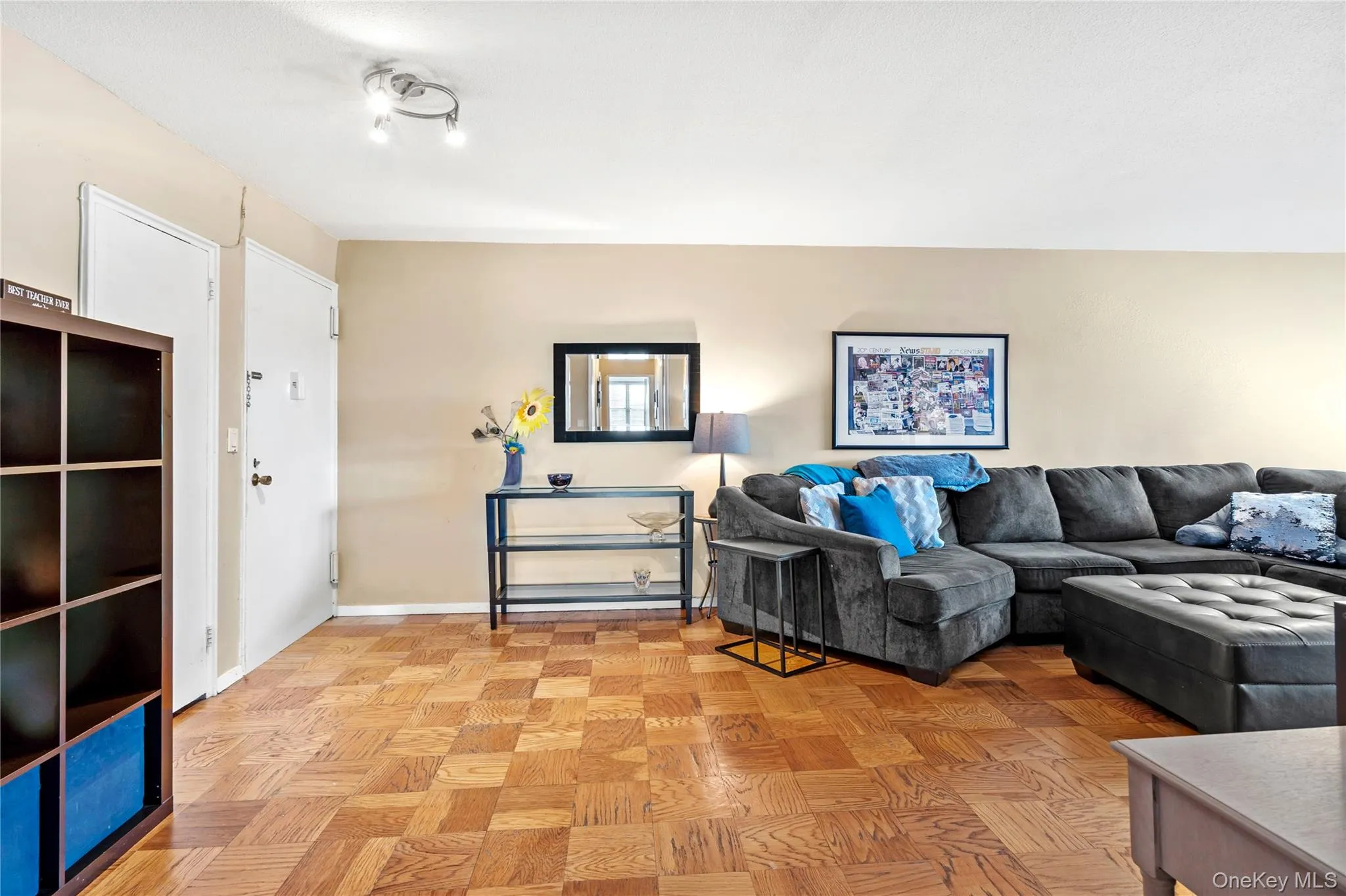 Living area featuring baseboards Living area featuring baseboards