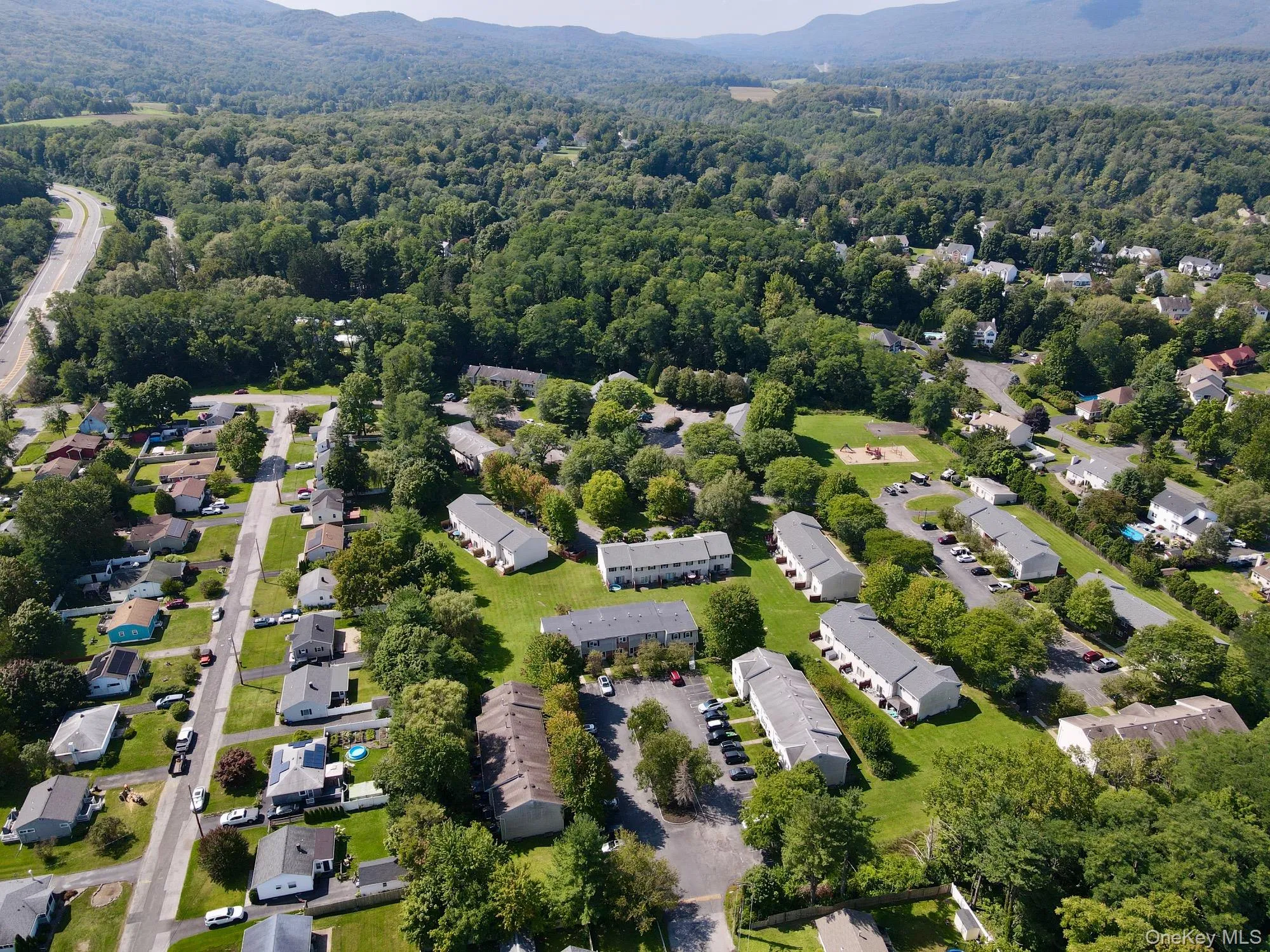 Aerial overview of property's location featuring nearby suburban area Aerial overview of property's location featuring nearby suburban area