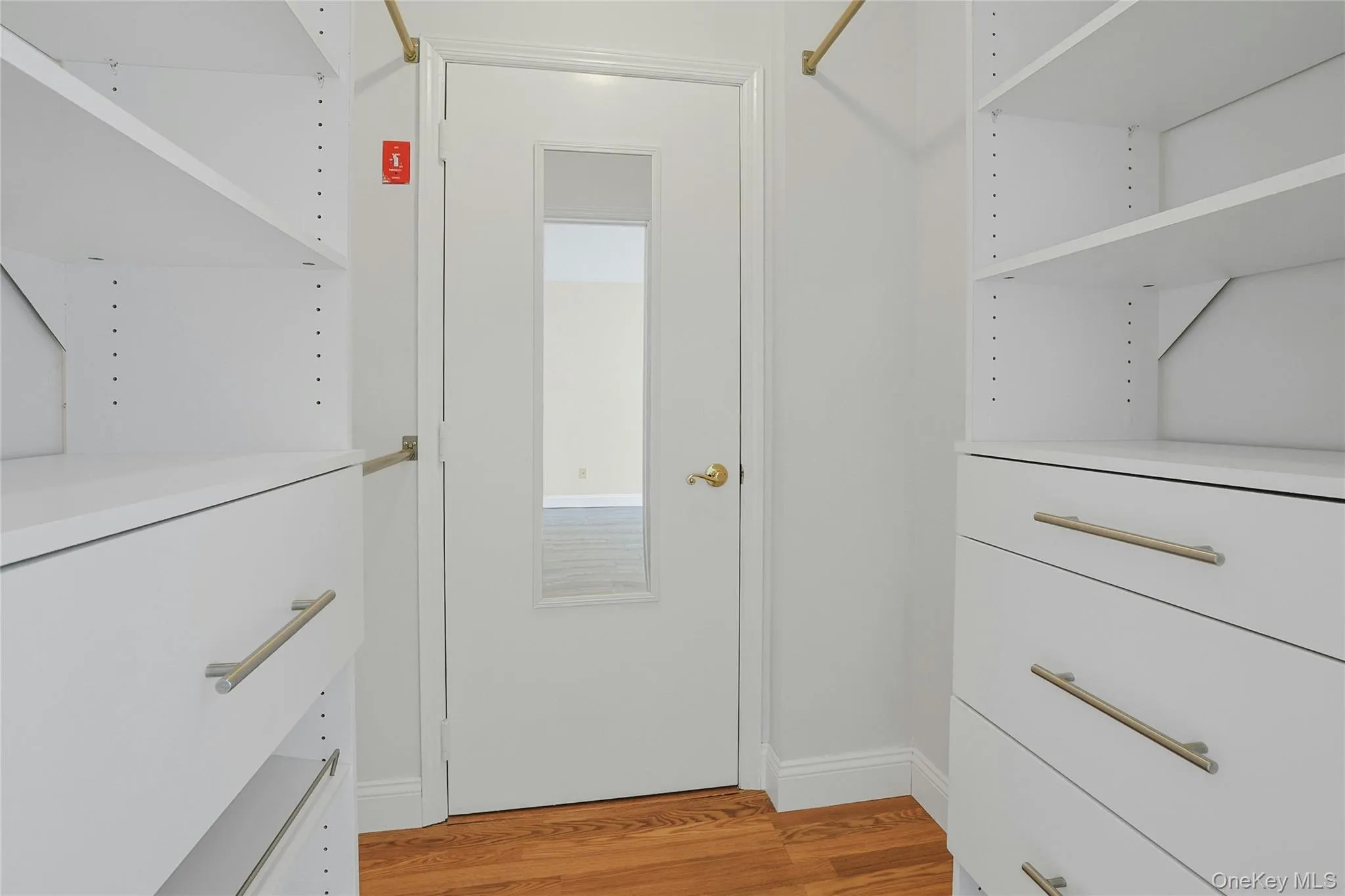 Fully outfitted and spacious walk-in closet. Fully outfitted and spacious walk-in closet.