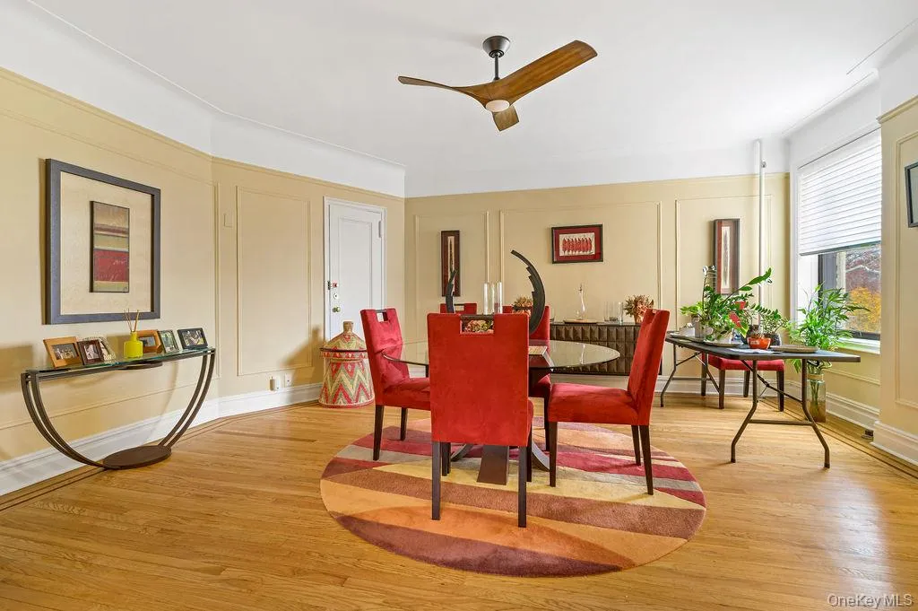 Dining room featuring windowpane molding Dining room featuring windowpane molding