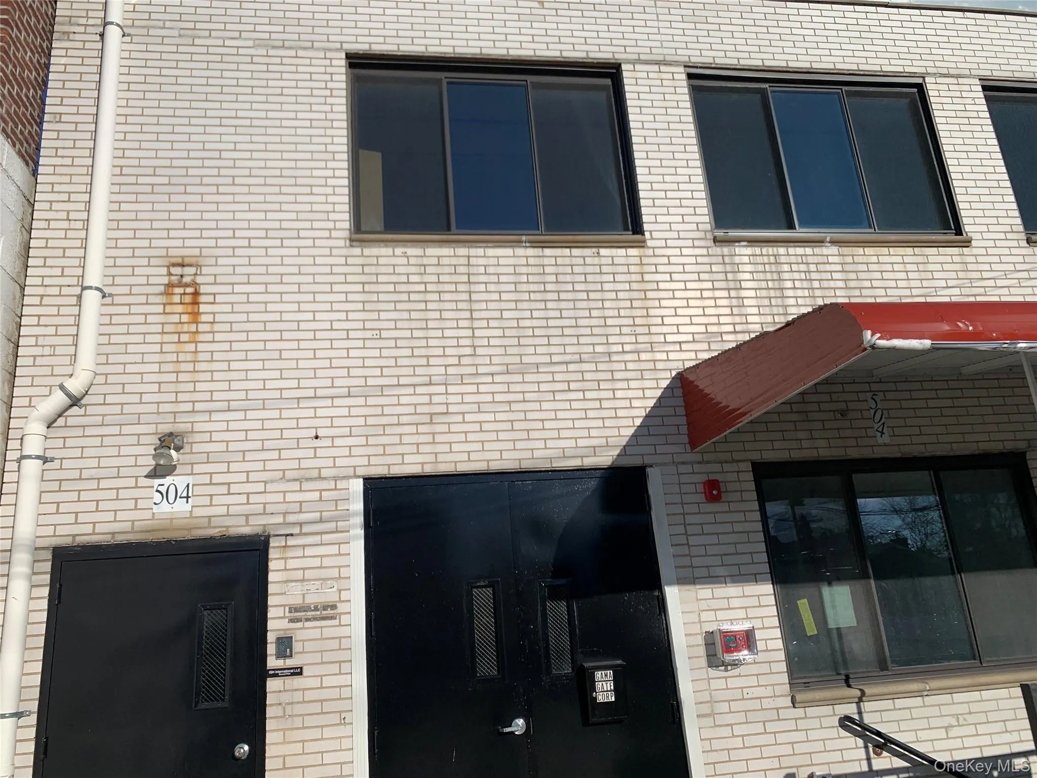 View of home's exterior with brick siding View of home's exterior with brick siding