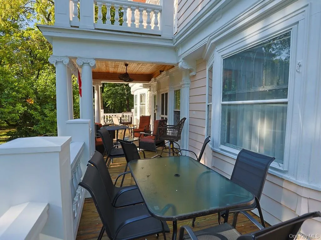 Patio / terrace featuring outdoor dining space and ceiling fan Patio / terrace featuring outdoor dining space and ceiling fan