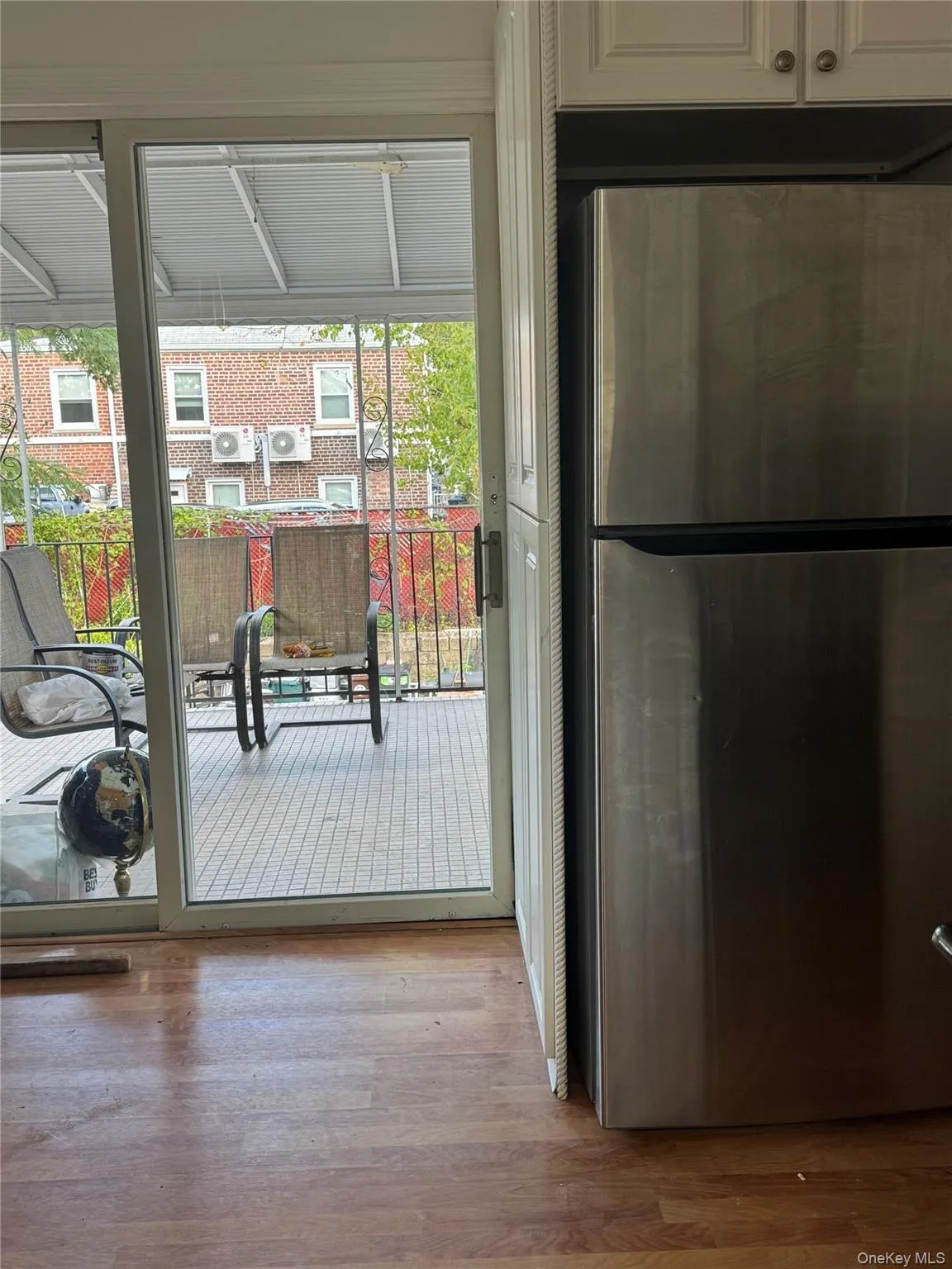 Entryway with wood finished floors Entryway with wood finished floors