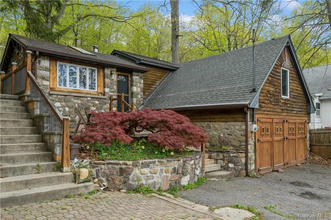 The Cottage has lake views and newer roof. The Cottage has lake views and newer roof.