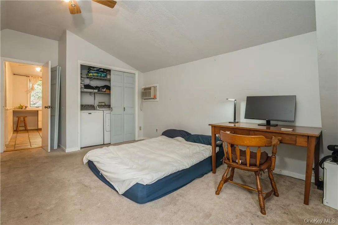 primary bedroom in cottage. Large enough for king with numerous closets & laundry. primary bedroom in cottage. Large enough for king with numerous closets & laundry.