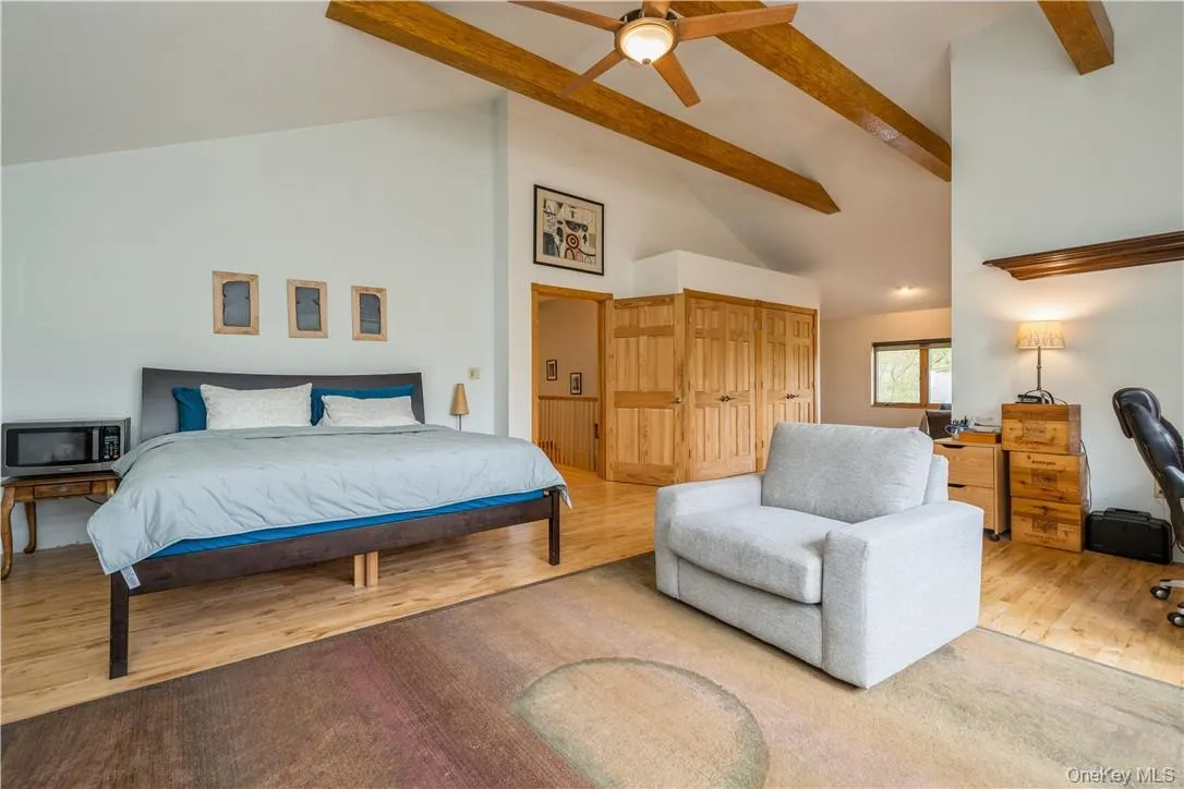 Sensational master bedroom - very spacious, cathedral ceilings, lake views, huge walk in bathroom with additional walk in closet, plus enclosed balcony with gorgeous views of Greenwood Lake. Sensational master bedroom - very spacious, cathedral ceilings, lake views, huge walk in bathroom with additional walk in closet, plus enclosed balcony with gorgeous views of Greenwood Lake.