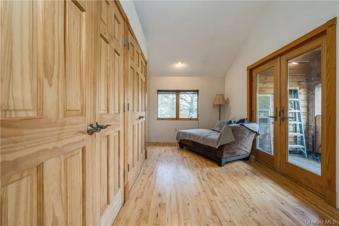 Wall of closets, beautiful hardwoood floors, double glass doors to covered balcony. Wall of closets, beautiful hardwoood floors, double glass doors to covered balcony.
