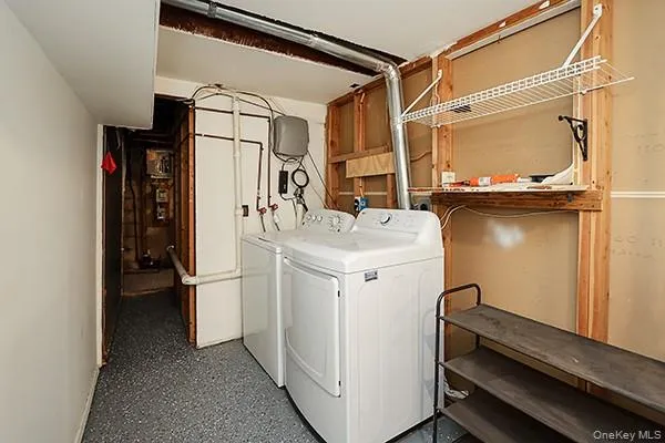 Laundry area with washer and clothes dryer Laundry area with washer and clothes dryer