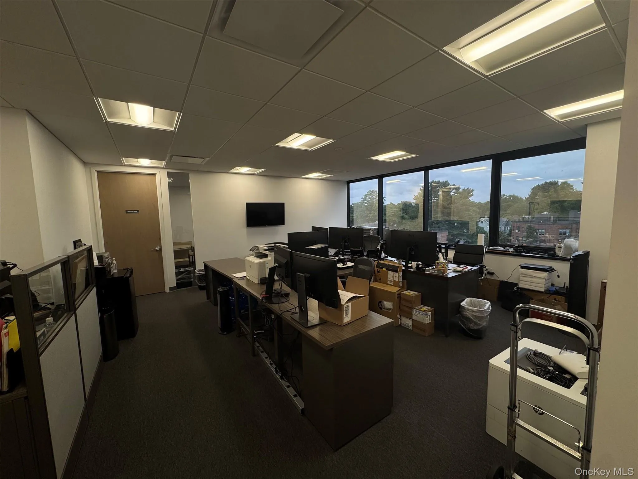 Office space with a drop ceiling Office space with a drop ceiling