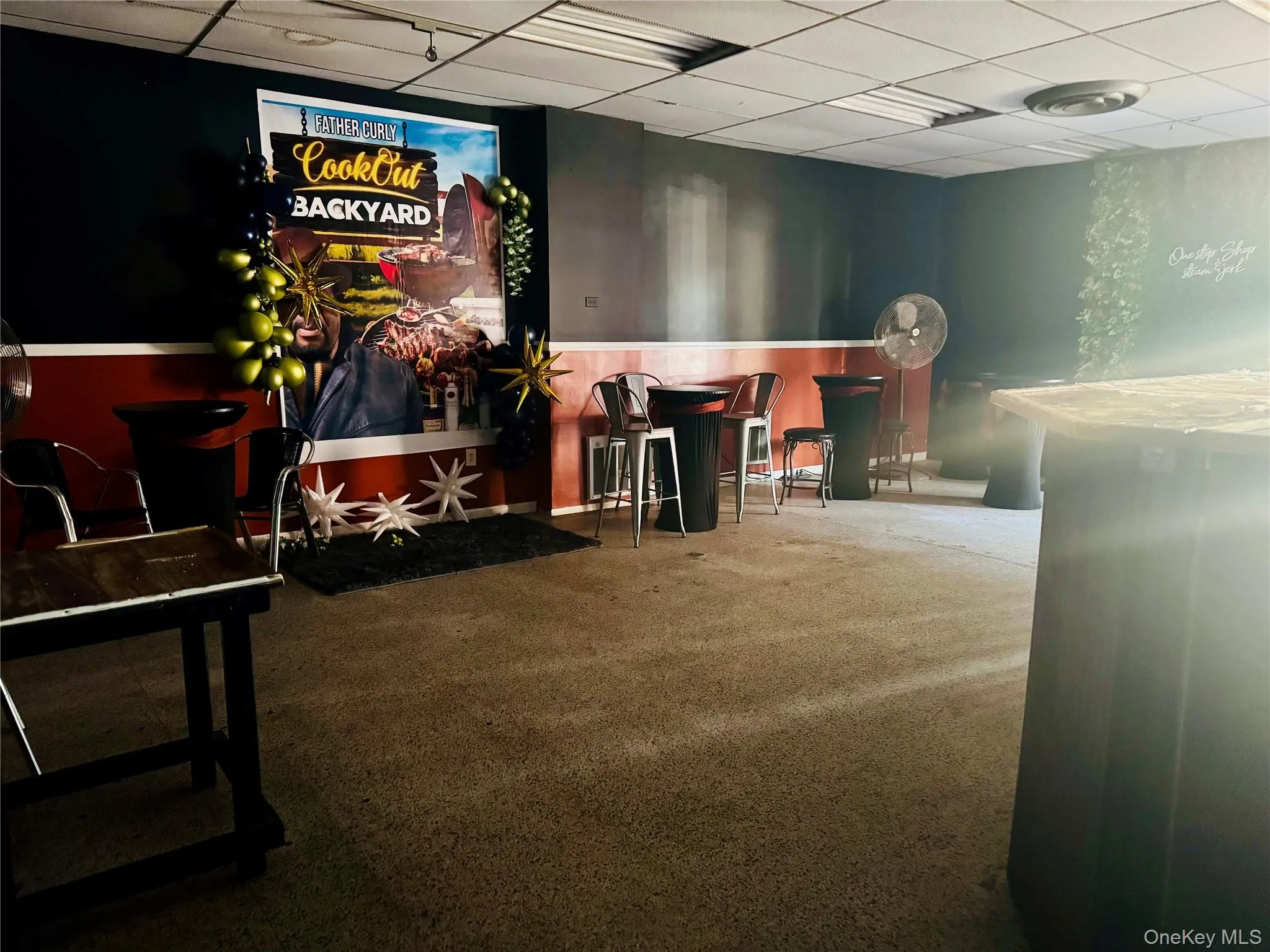 Reception area with a paneled ceiling Reception area with a paneled ceiling