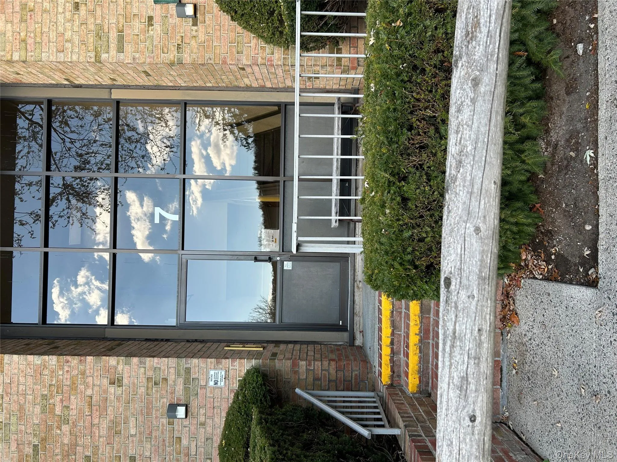 Doorway to property with brick siding Doorway to property with brick siding
