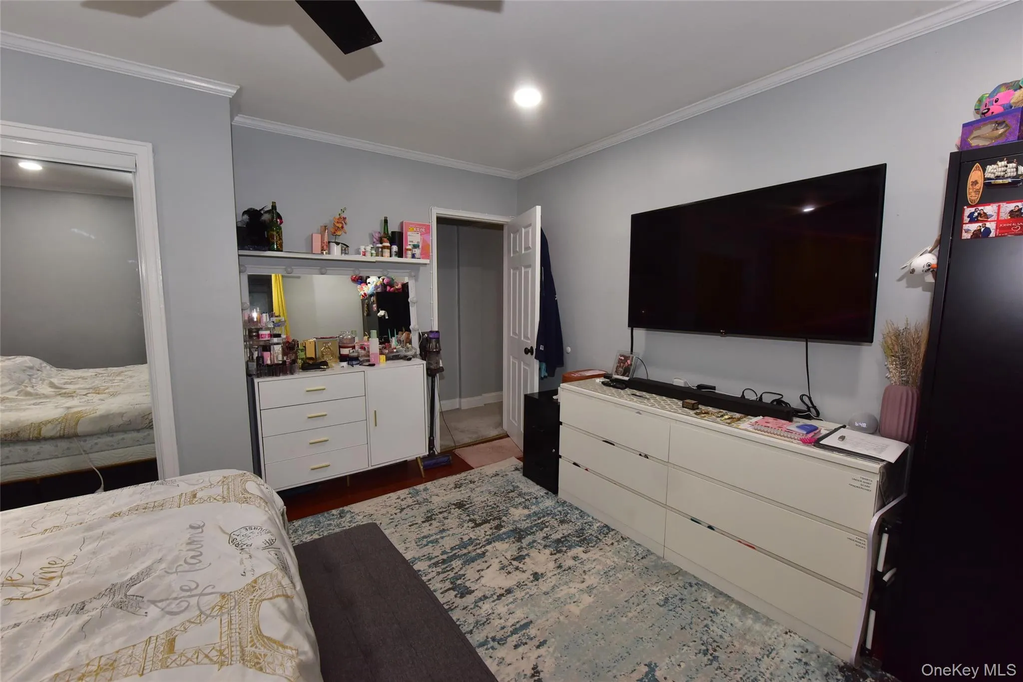Bedroom featuring ornamental molding, a ceiling fan, and recessed lighting Bedroom featuring ornamental molding, a ceiling fan, and recessed lighting