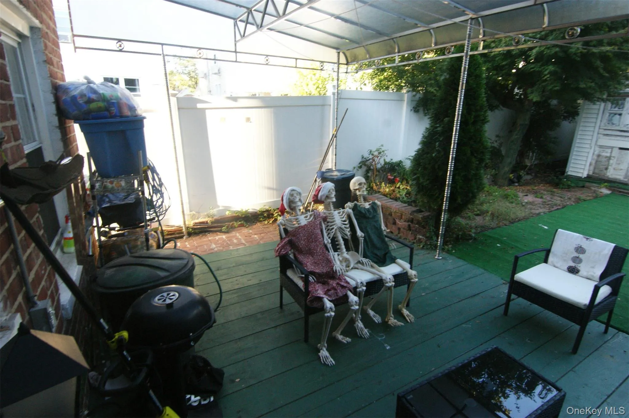 Wooden deck with a fenced backyard Wooden deck with a fenced backyard