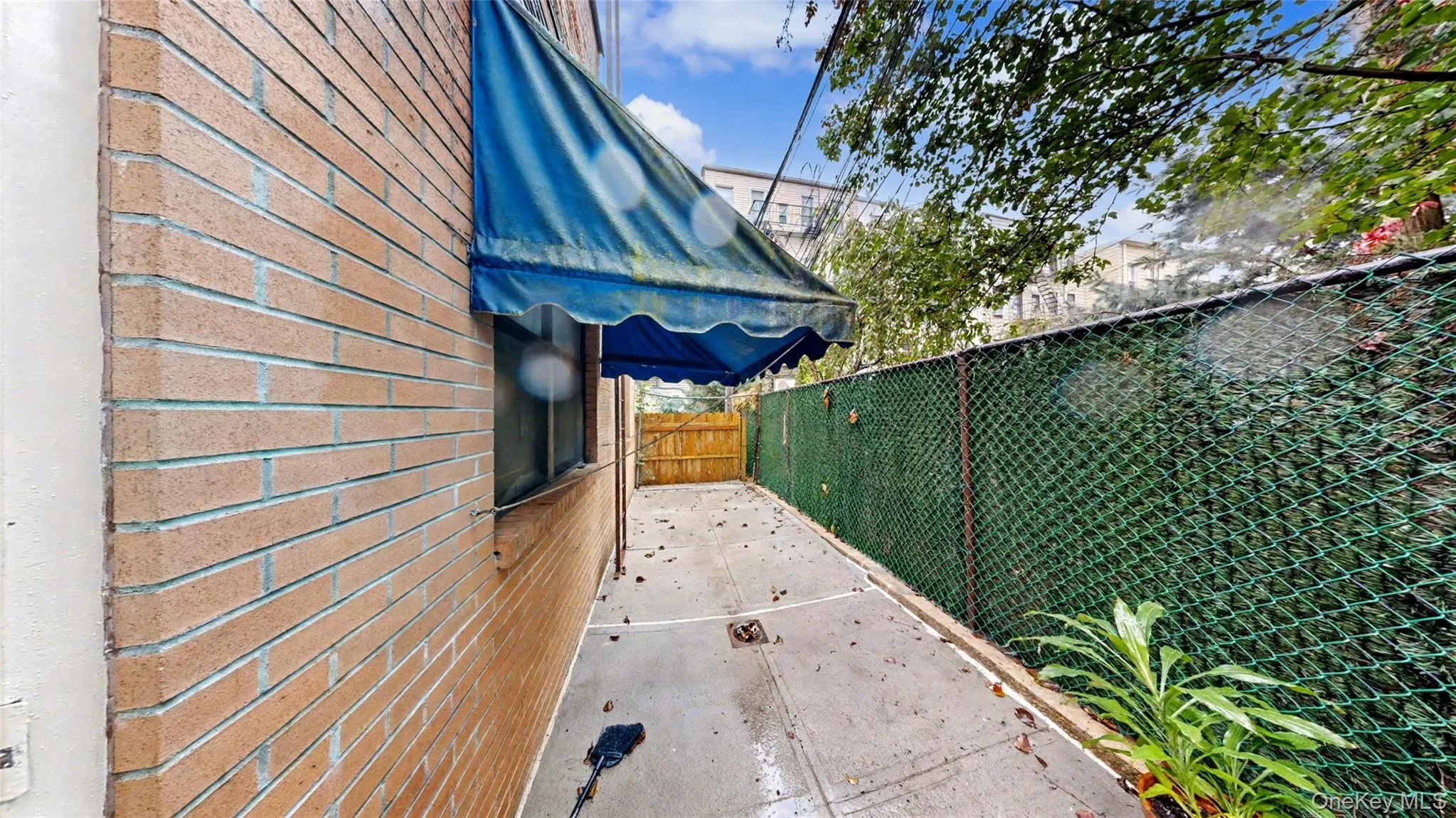 Fenced backyard featuring a patio Fenced backyard featuring a patio