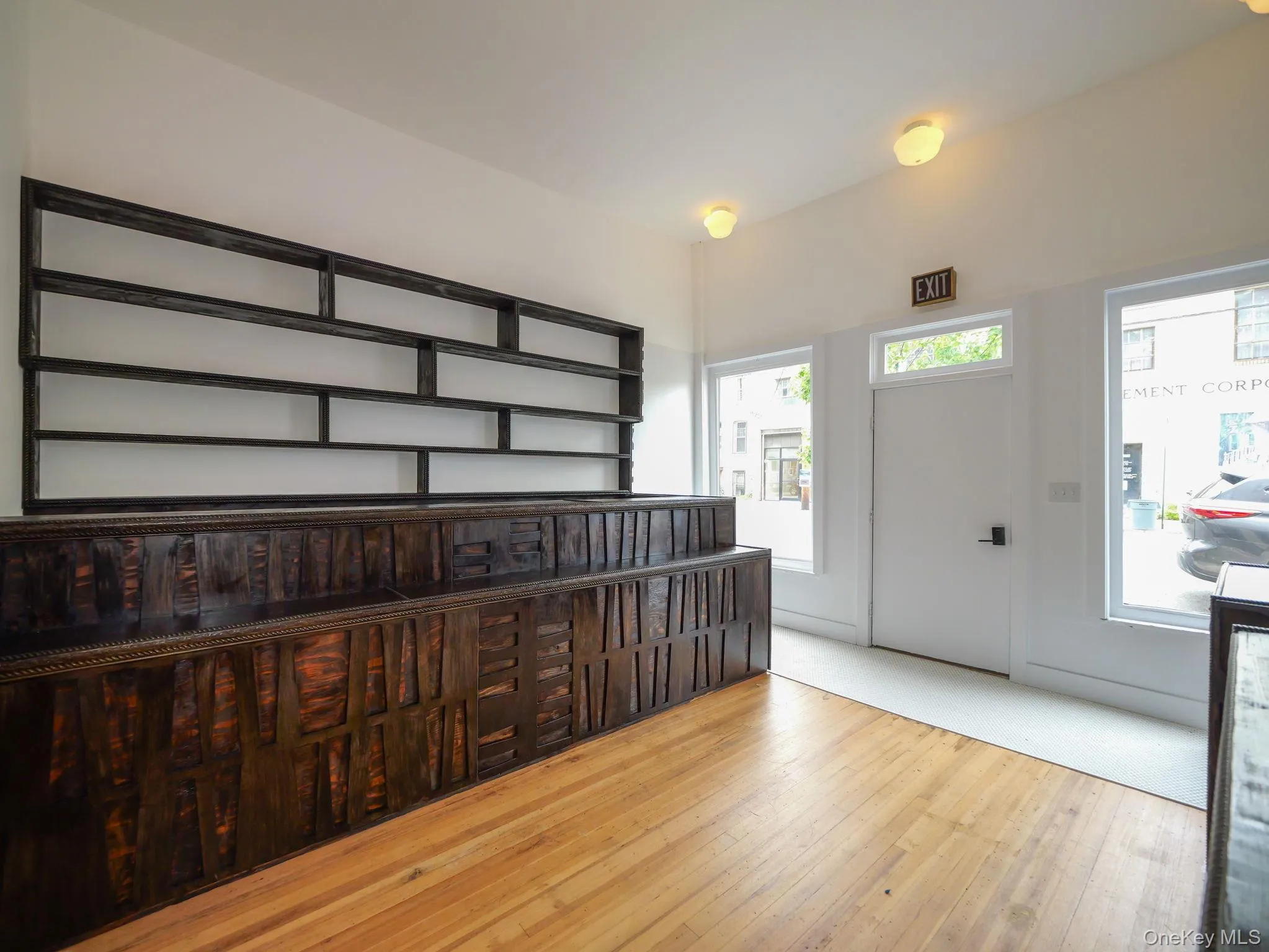 Entrance foyer with wood-type flooring Entrance foyer with wood-type flooring