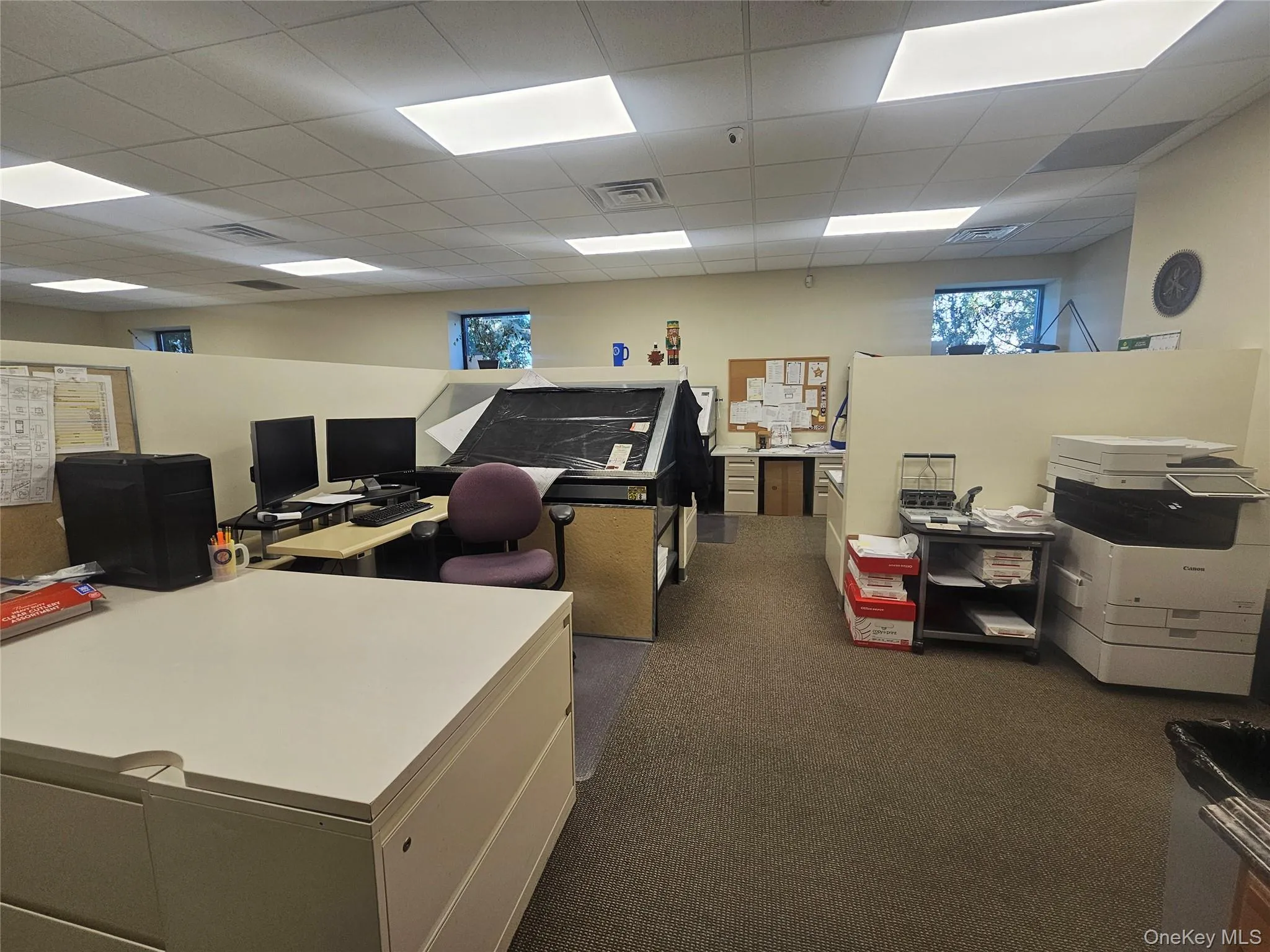 Office area featuring a paneled ceiling Office area featuring a paneled ceiling