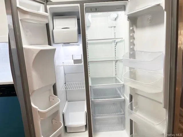 Kitchen view of freestanding refrigerator Kitchen view of freestanding refrigerator