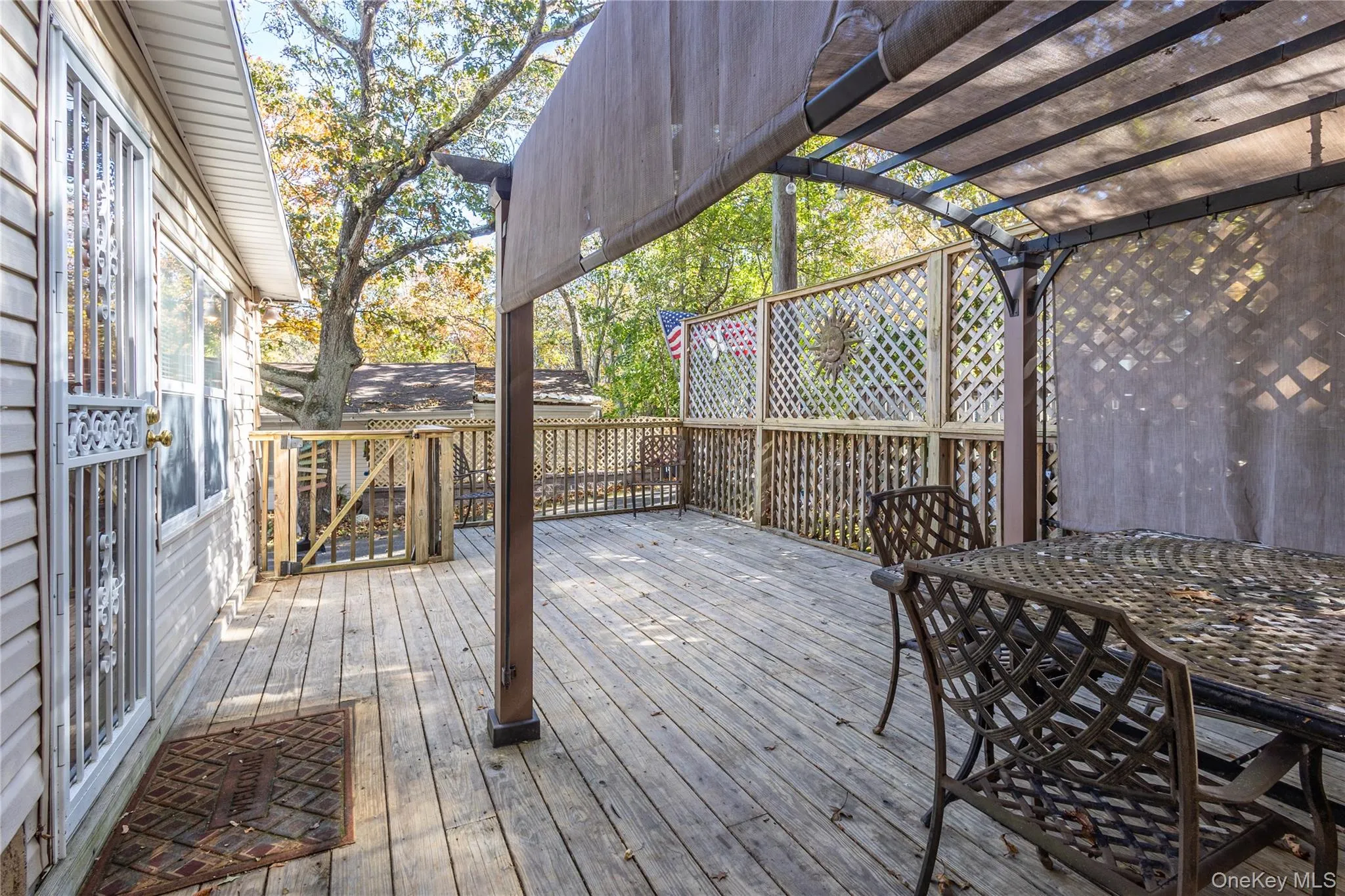 Deck with outdoor dining area Deck with outdoor dining area