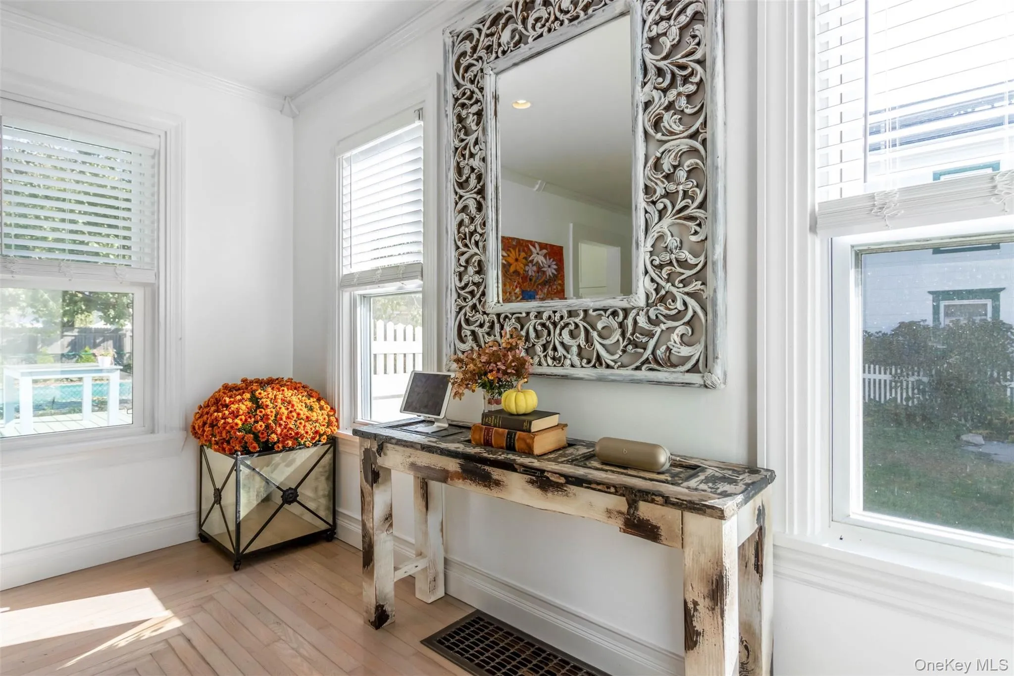 Detailed view of crown molding and wood finished floors Detailed view of crown molding and wood finished floors