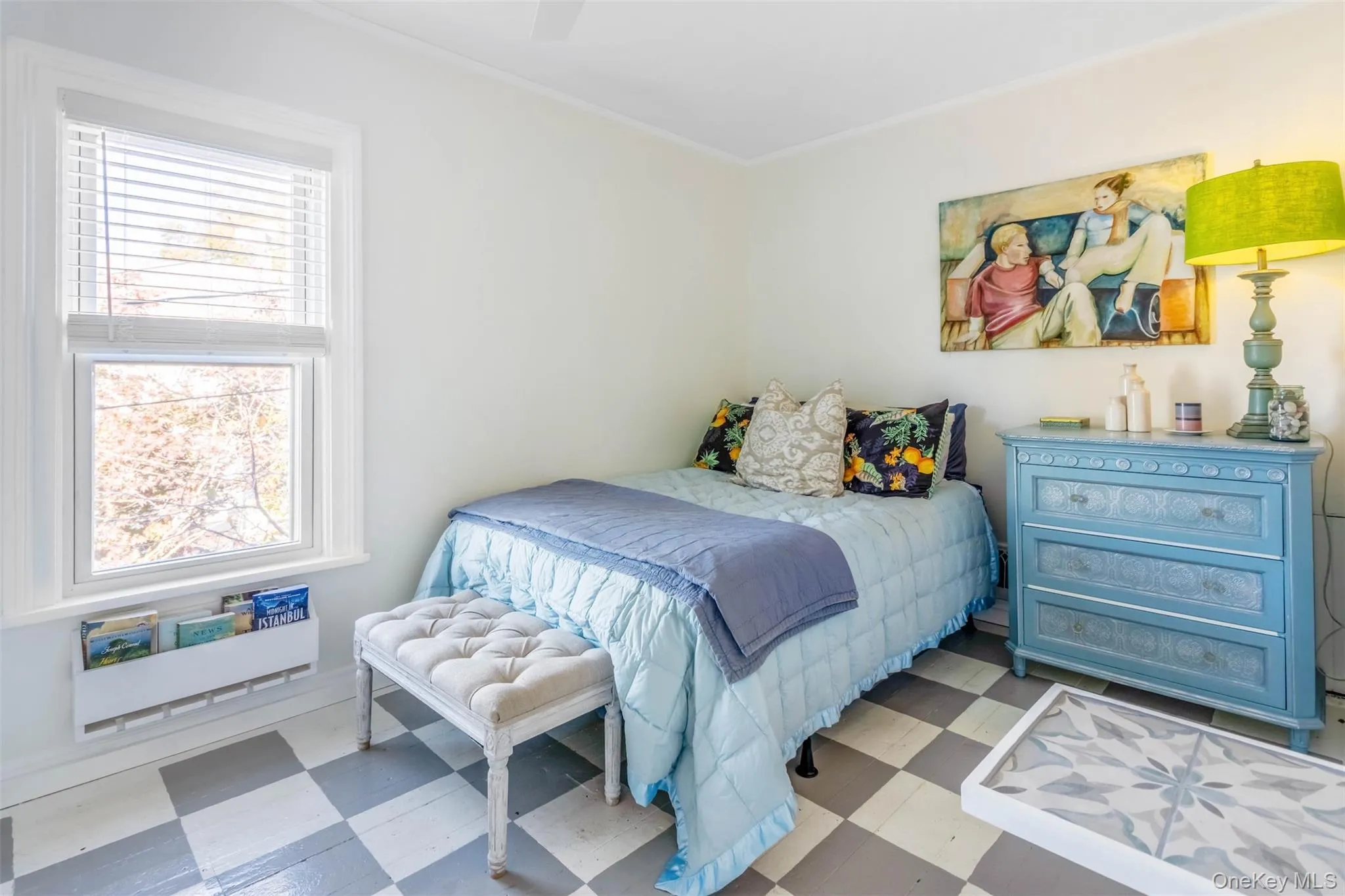 Bedroom featuring tile patterned floors, ceiling fan, and ornamental molding Bedroom featuring tile patterned floors, ceiling fan, and ornamental molding
