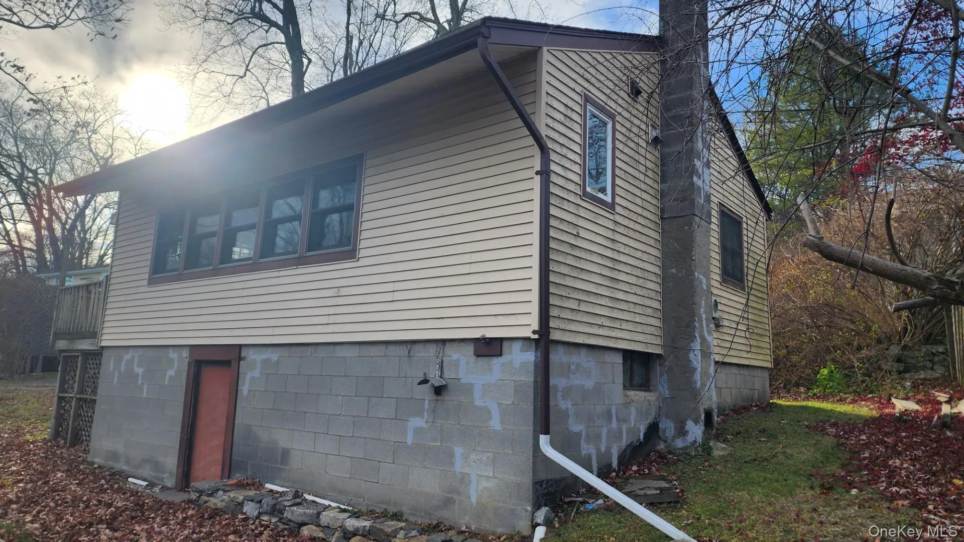 View of home's exterior with a chimney View of home's exterior with a chimney