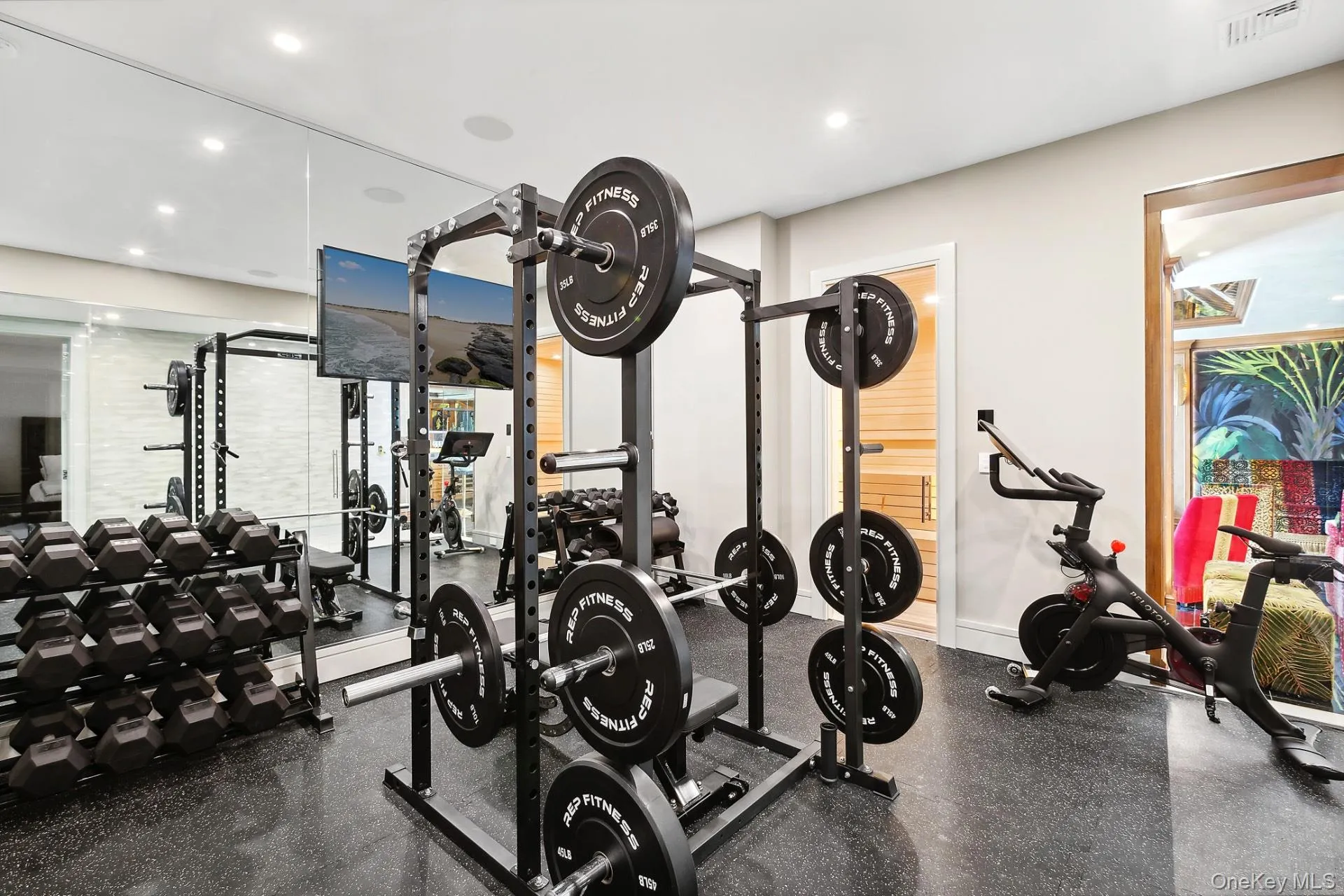 Gym with rubber floors and recessed lighting Gym with rubber floors and recessed lighting