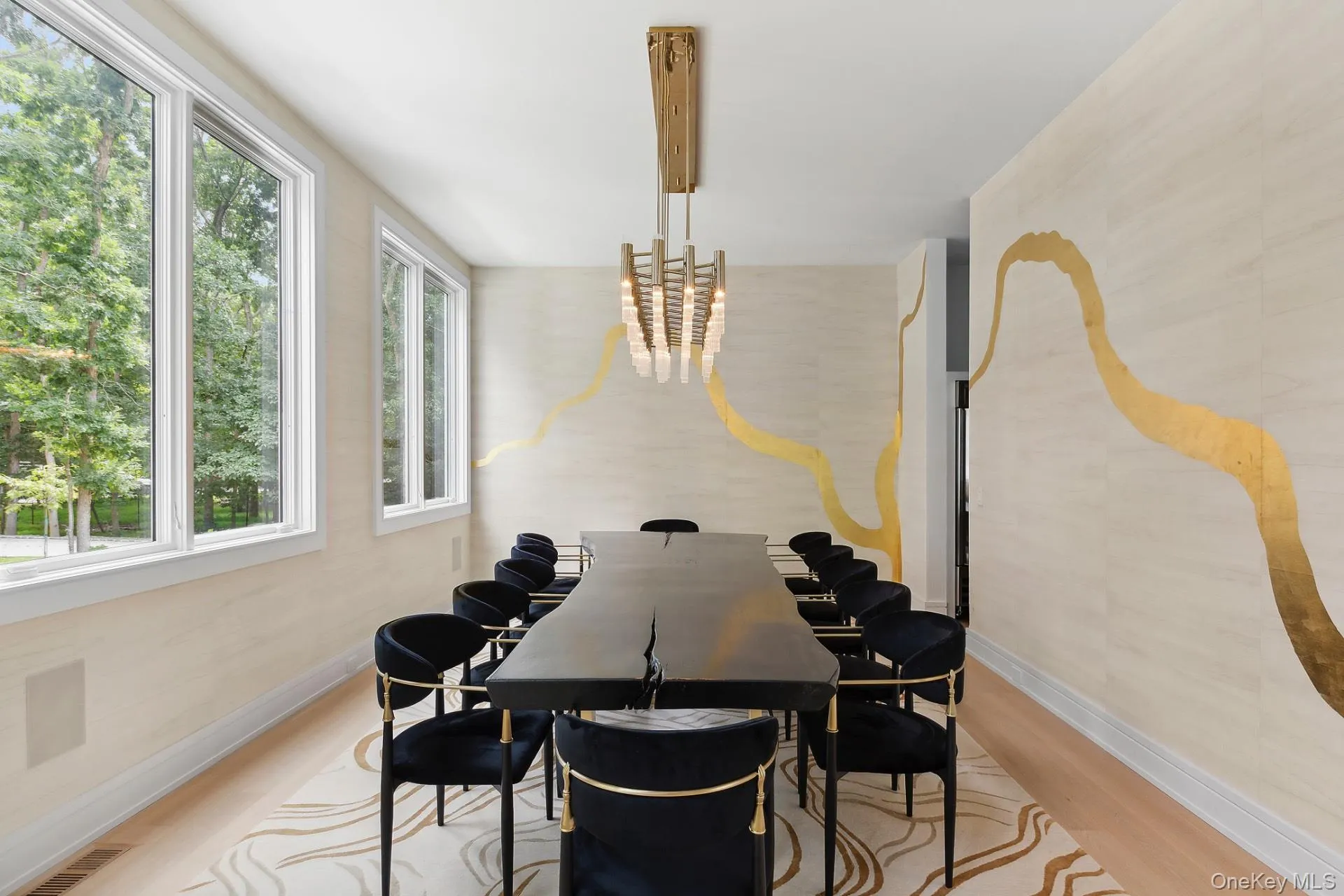 Dining space featuring wood finished floors Dining space featuring wood finished floors