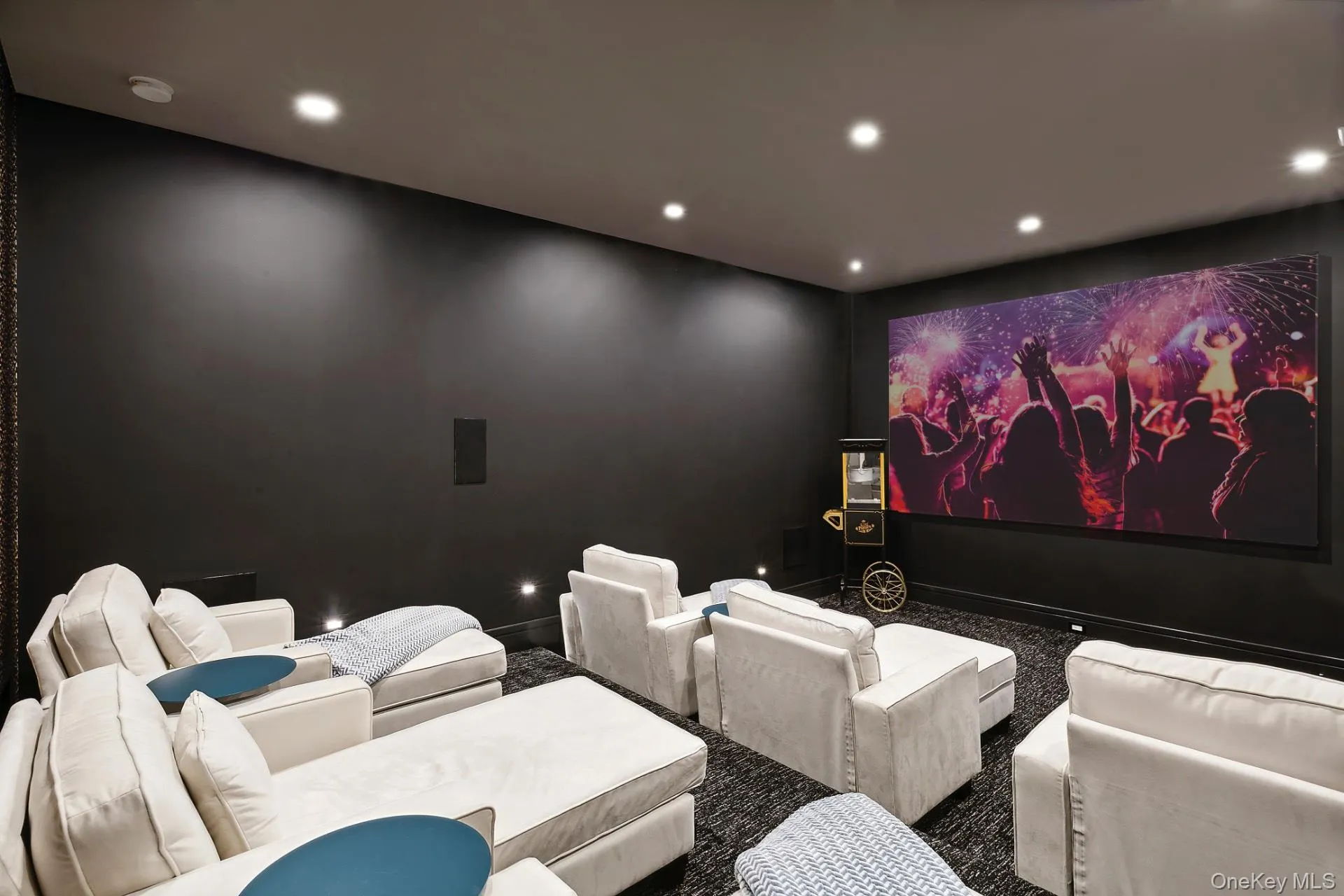 Cinema room featuring recessed lighting and carpet Cinema room featuring recessed lighting and carpet