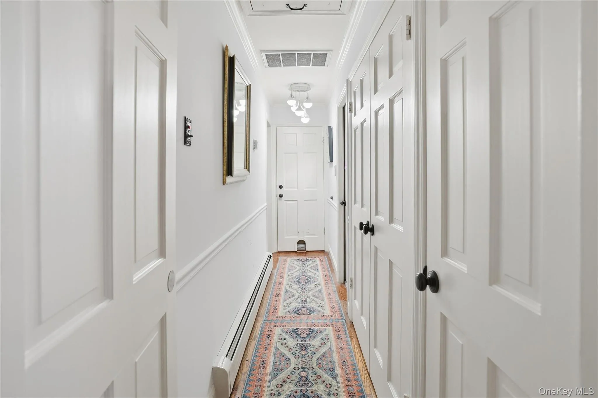 Hall to Laundry , Garage , and Lower Level Hall to Laundry , Garage , and Lower Level