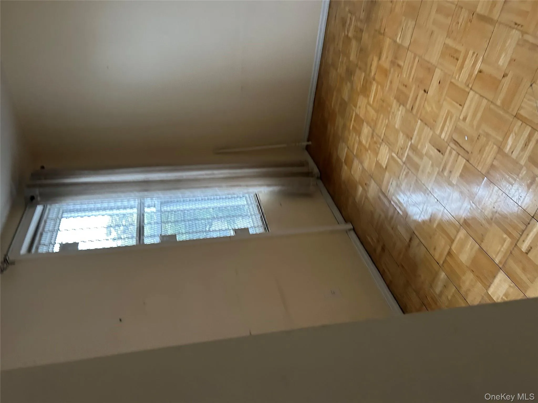 Unfurnished room with baseboards Unfurnished room with baseboards